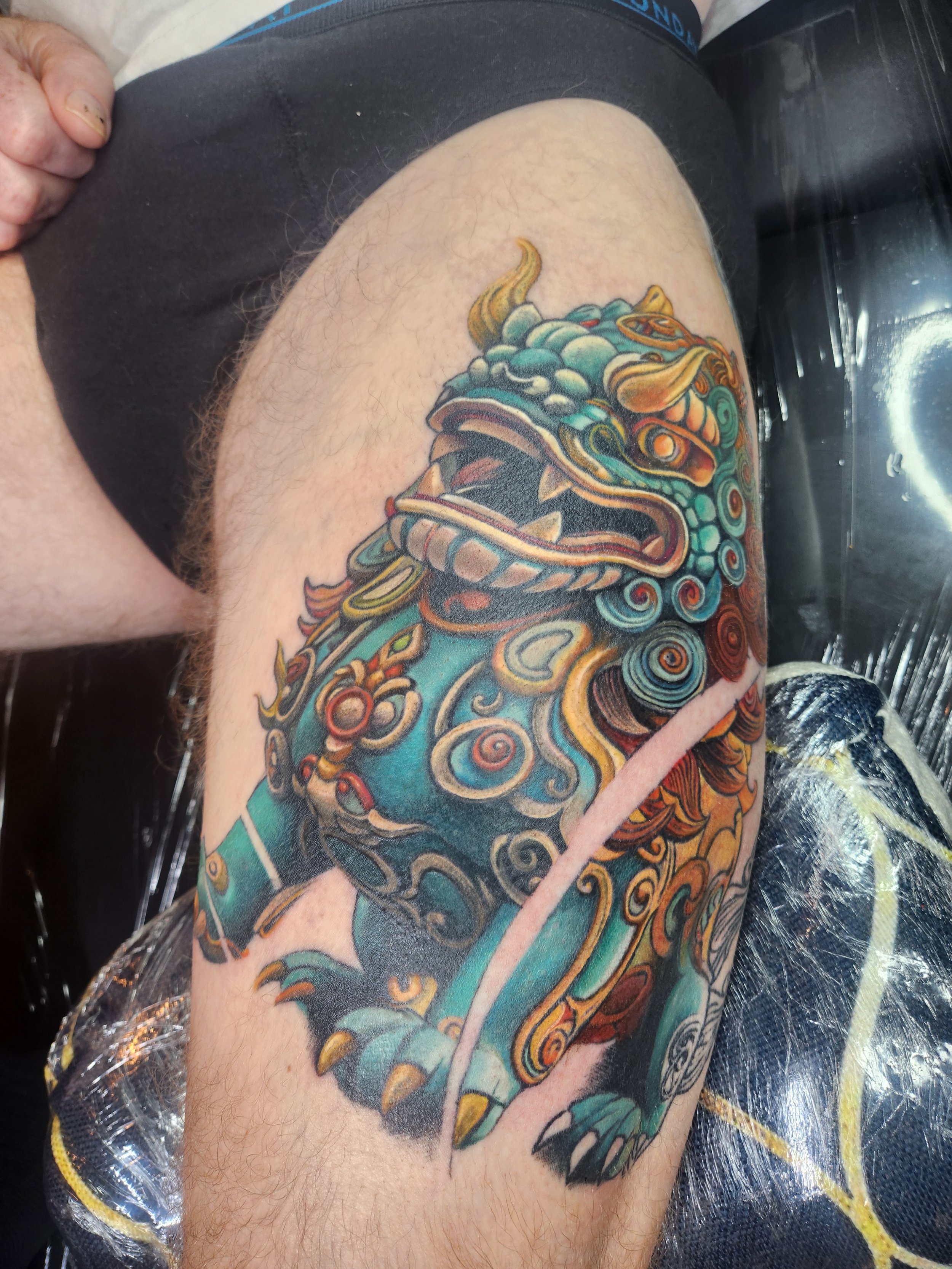 Colour tattoo of a foo dog