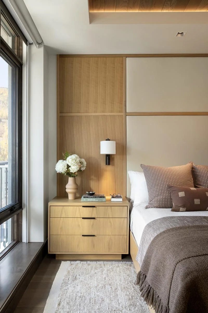 Honed-Studio-Interior-Design-Colorado-Golden-Peak-Bedroom-with-bedside-light-on.jpg