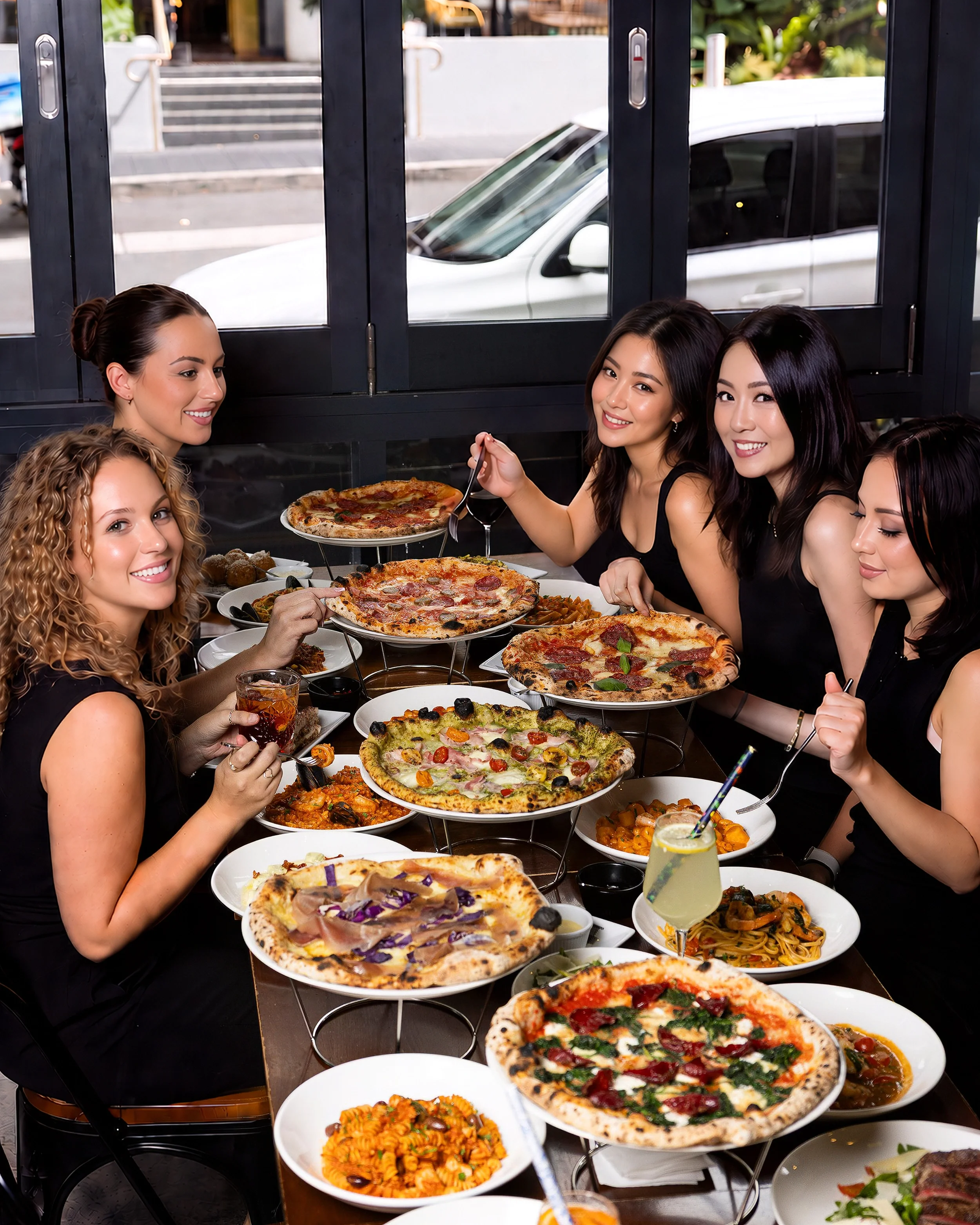 Girls eating a La Bufala Feast