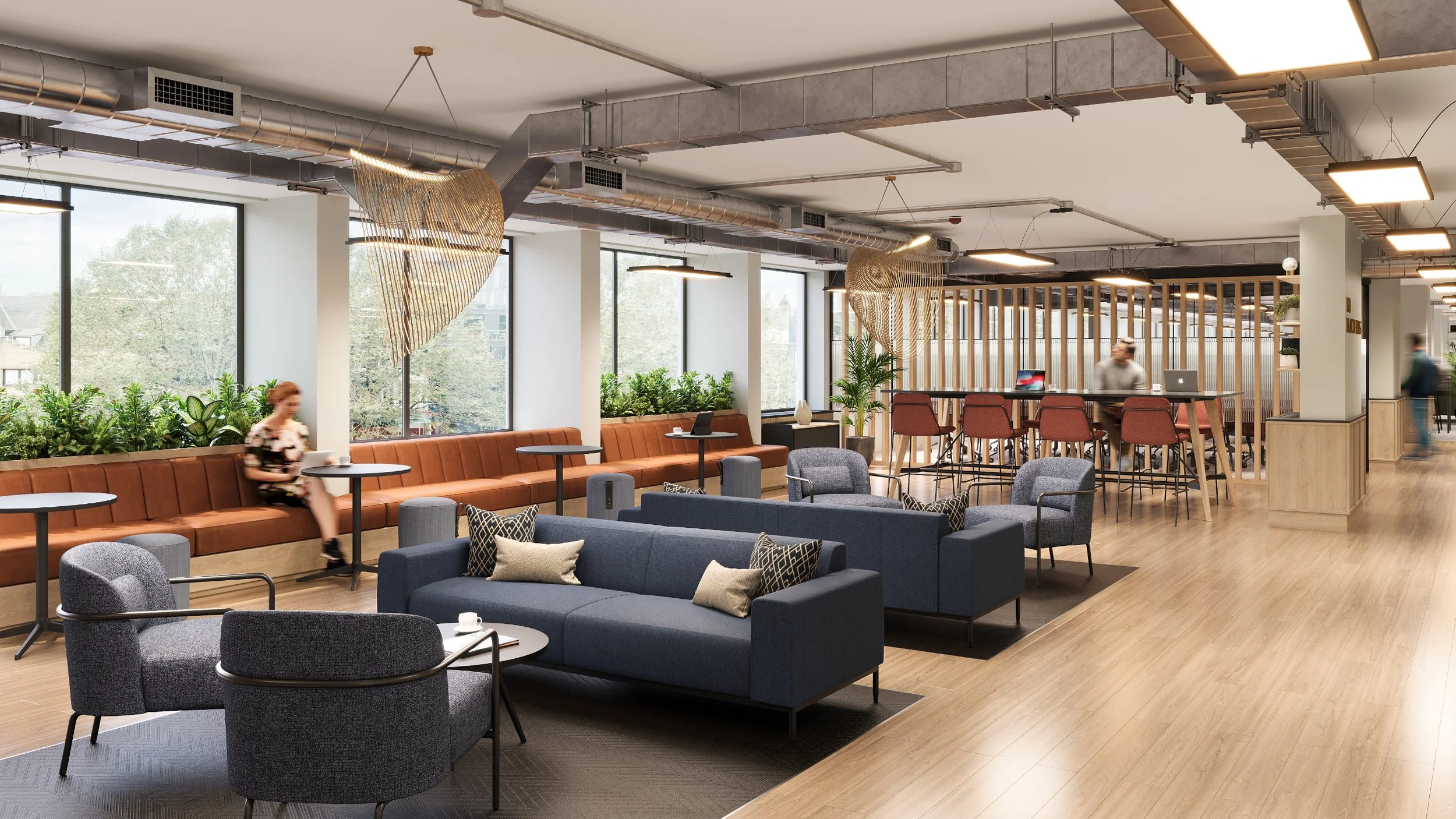Large collaborative reception lounge with window seating and touchdown working.