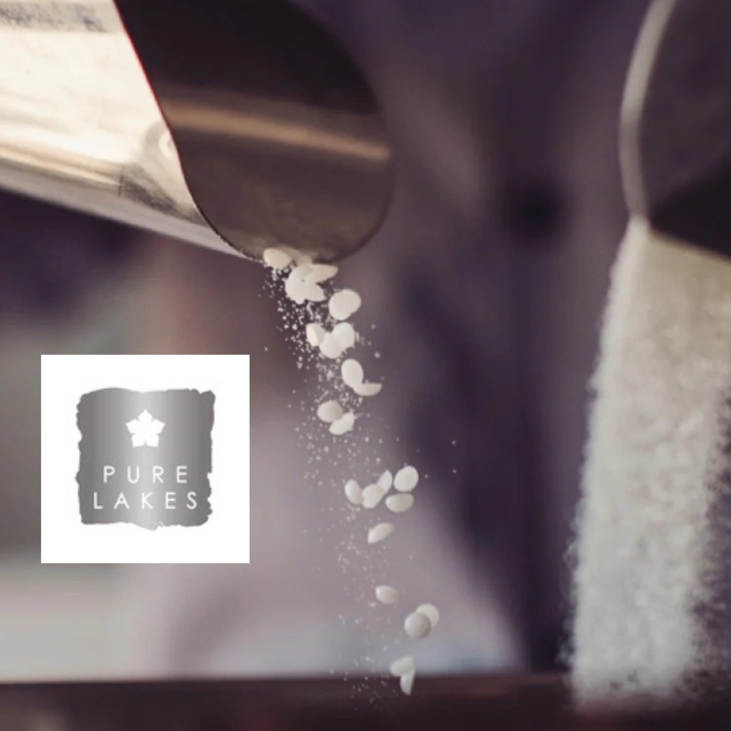 Let Me Stay help holiday home owners maximise their property's potential, offering a management service. Kitchen countertop with a sink, glassware on wooden display shelves. Home Interiors & Renovation Exhibition 2026.   #hirecumbria