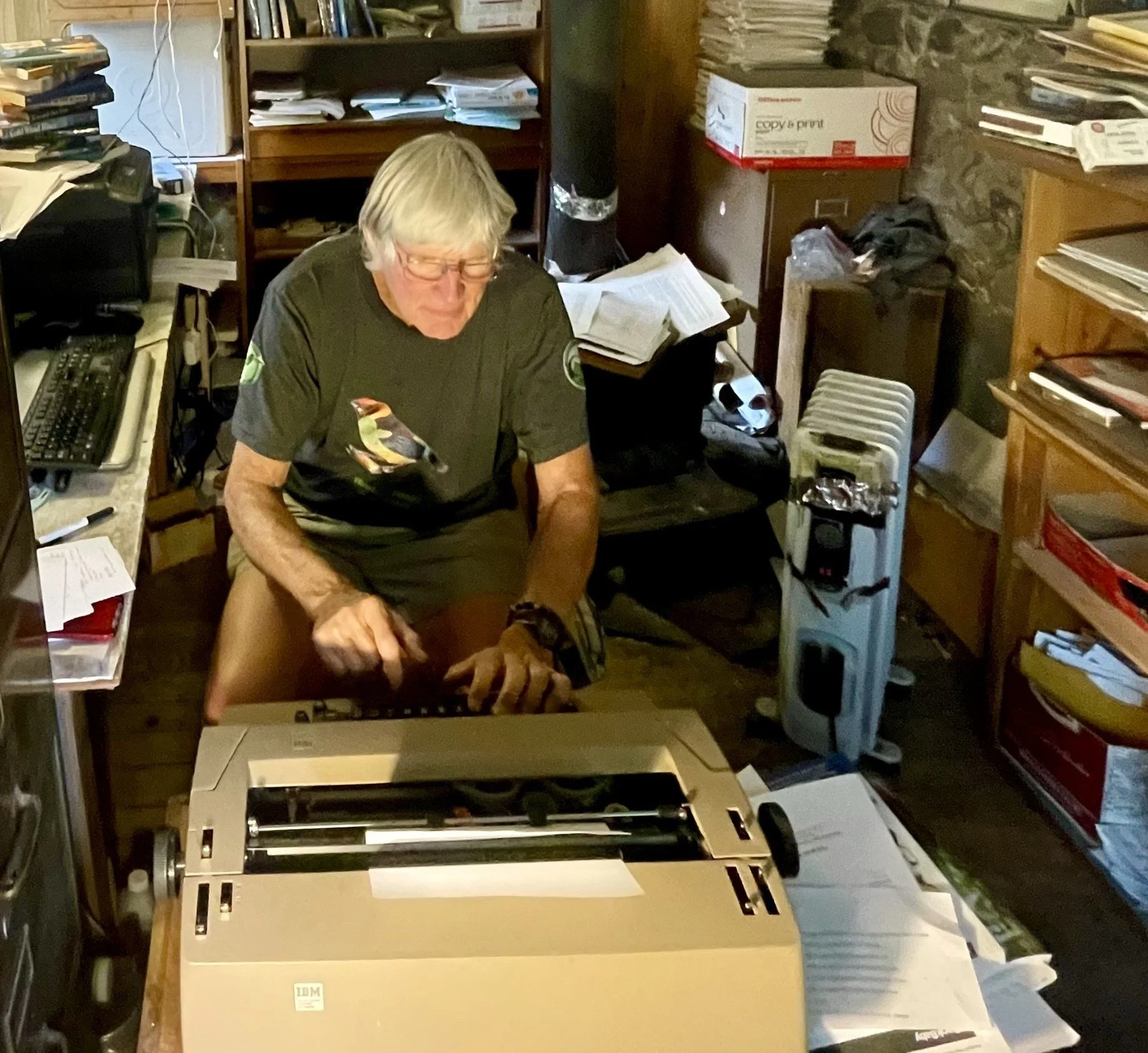 Kent Nelson working in his writing studio.jpg