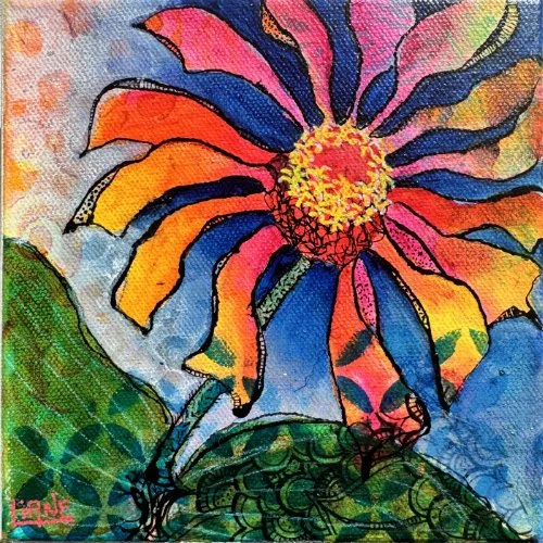 Vibrant painting of a colourful flower with pink, yellow, and orange petals and a red centre, set against a blue sky and green hills.