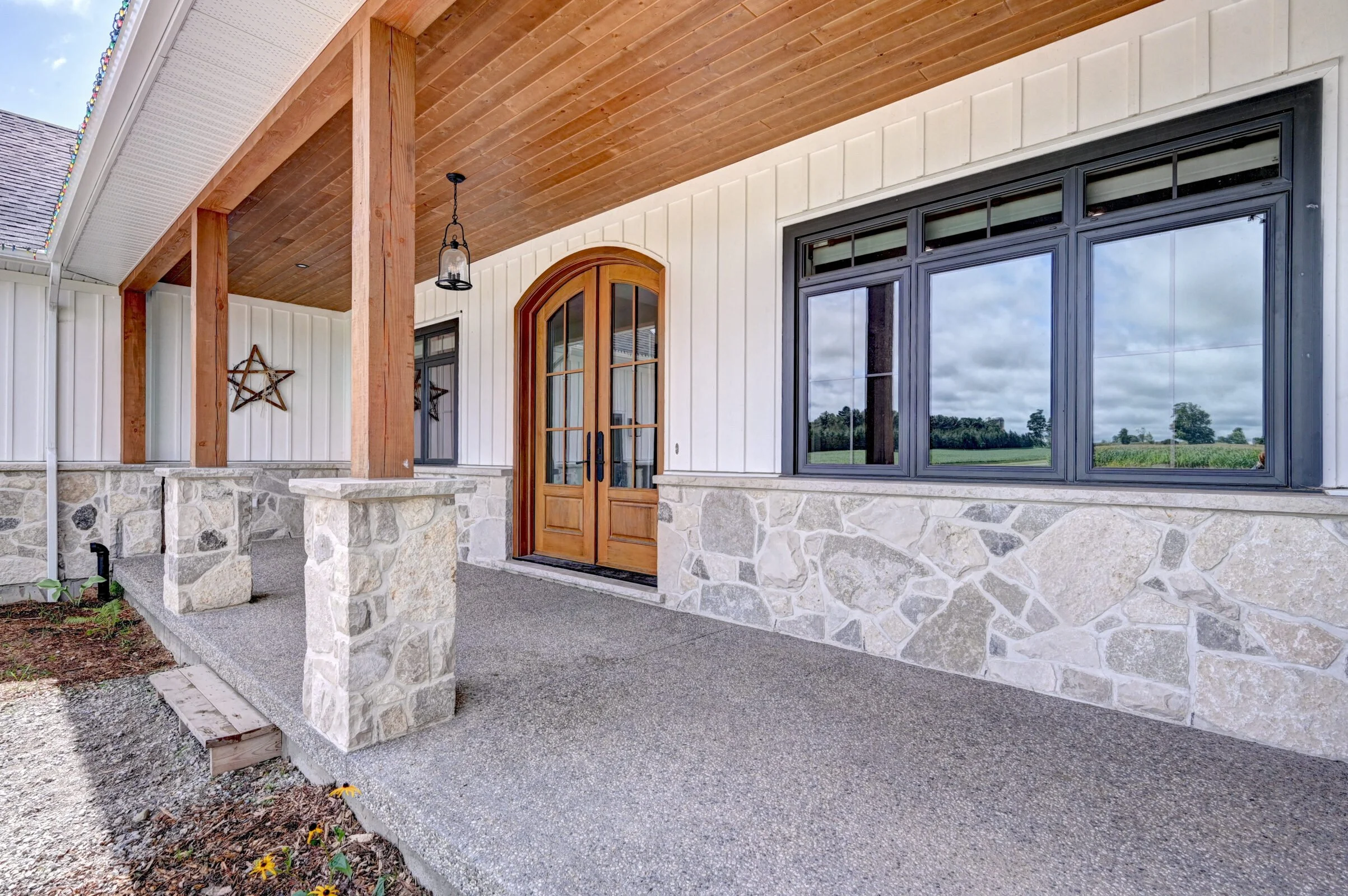 shot of custom front porch carpentry work