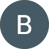 A dark gray circular icon with a white capital letter B in the center