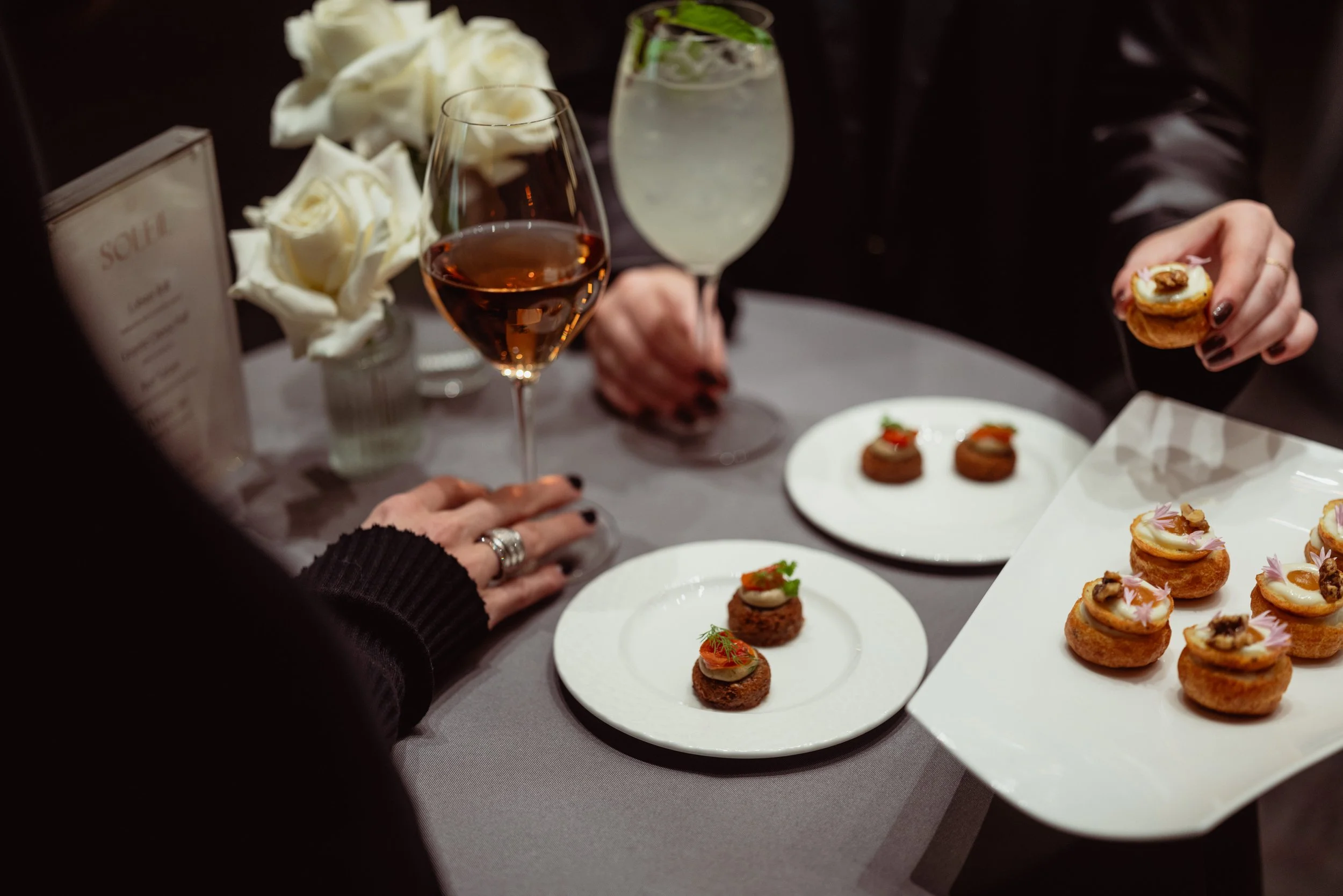 guests enjoying canapes and drinks