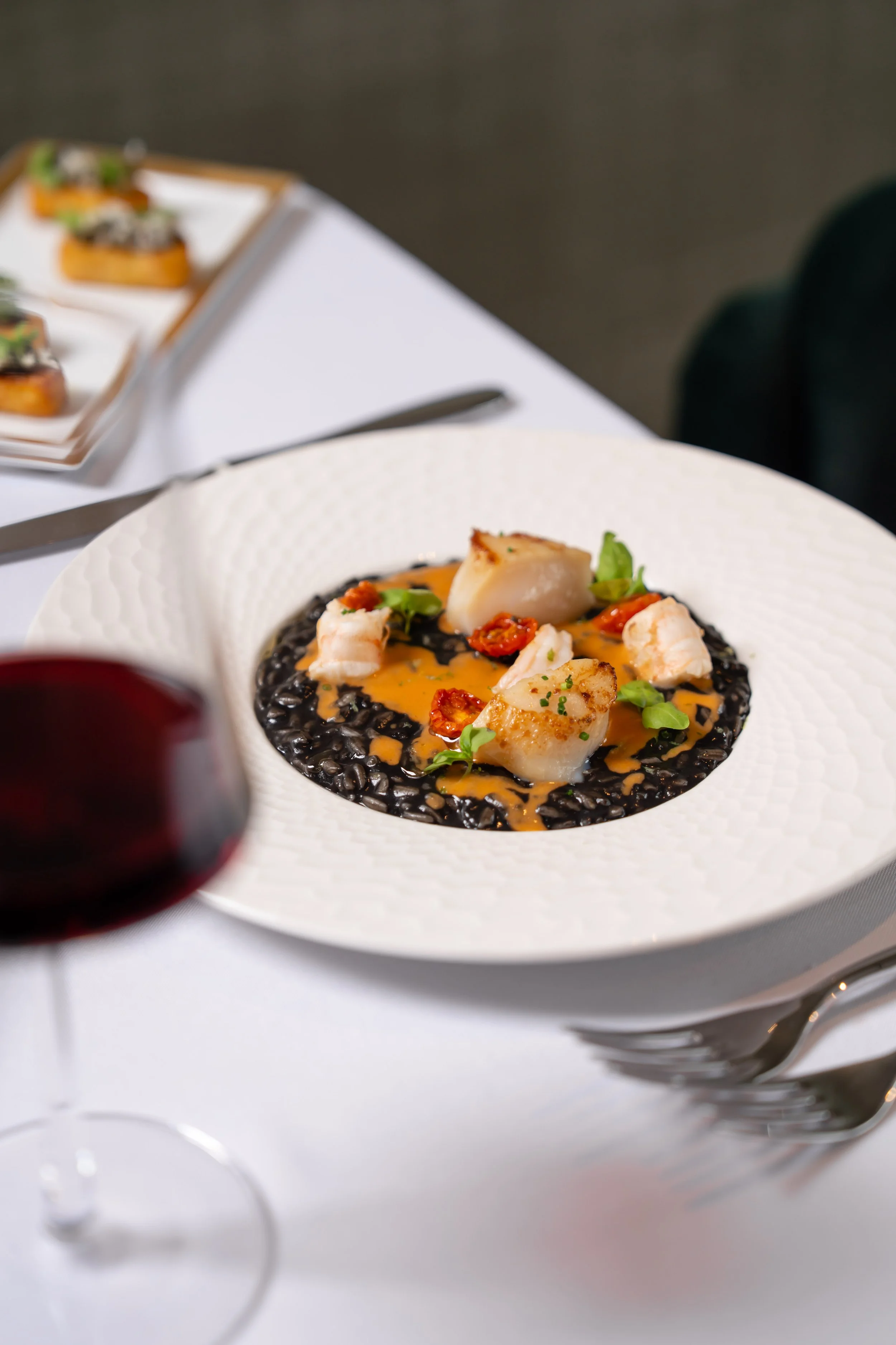 risotto and red wine glass