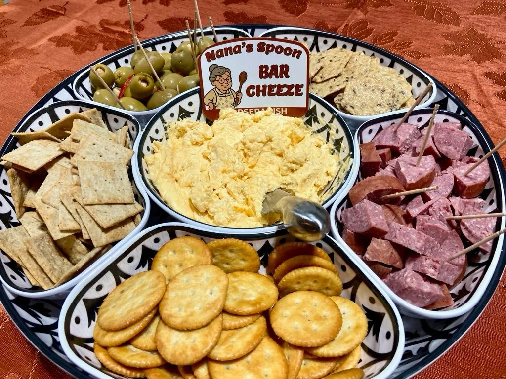 Thanksgiving always brought everyone to Nana&rsquo;s table, and her food kept us there a little longer. We&rsquo;re keeping that tradition alive. A bowl of Nana&rsquo;s Spoon Bar Cheese in the center still brings the family together the same way she 