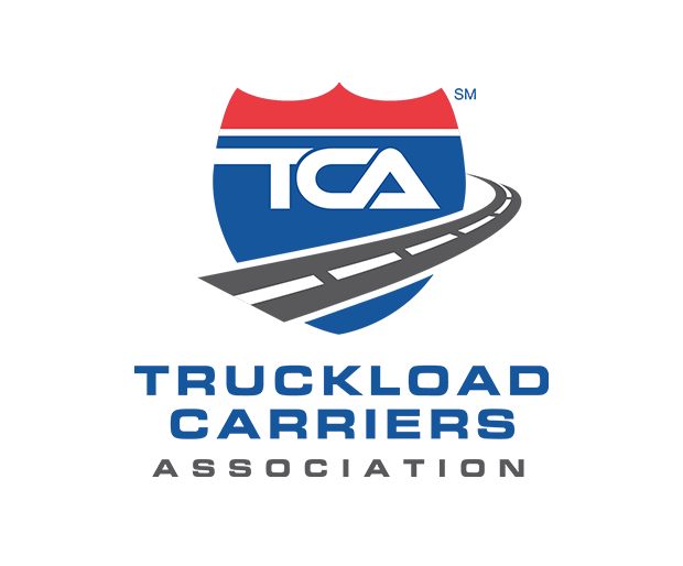 Logo of Truckload Carriers Association with a shield, a road, and the acronym TCA
