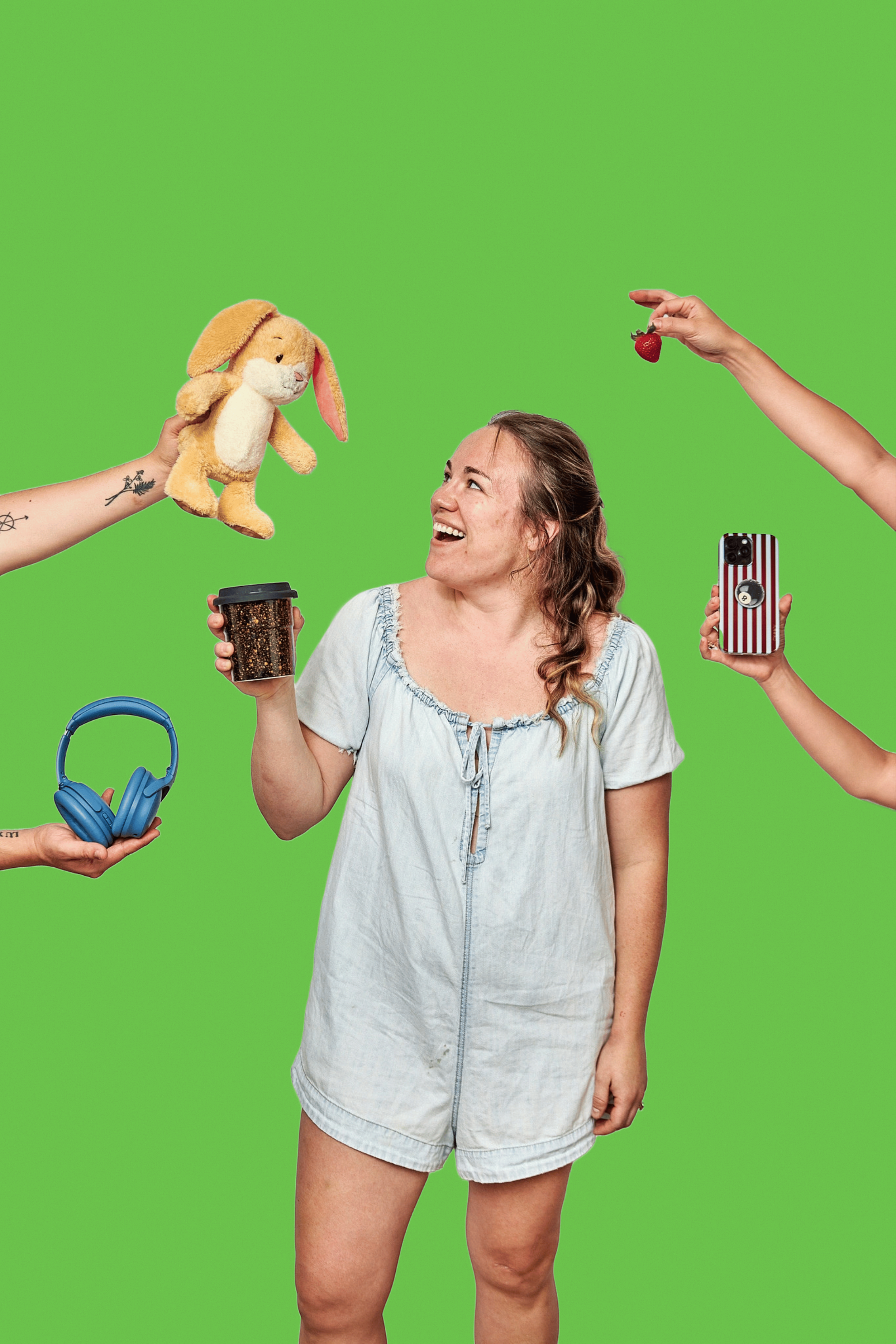 A woman in a light-colored dress smiling while holding a cup of coffee, surrounded by hands holding a stuffed bunny, a strawberry, blue headphones, a smartphone with an American flag case, and a cup of coffee, on a bright green background.