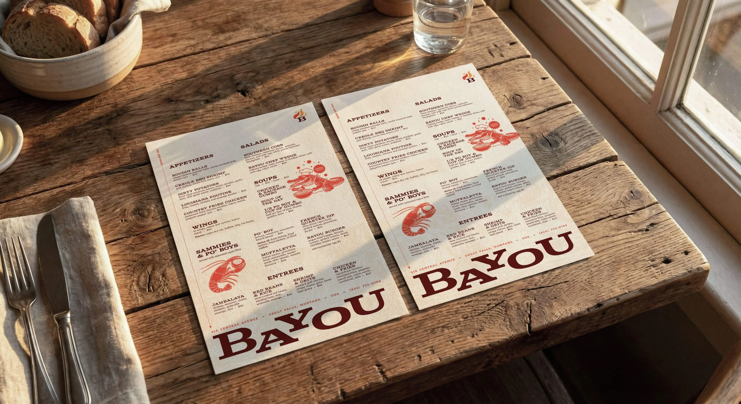 Menu designs for Bayou cajun full service restaurant branding on a rustic table near a window