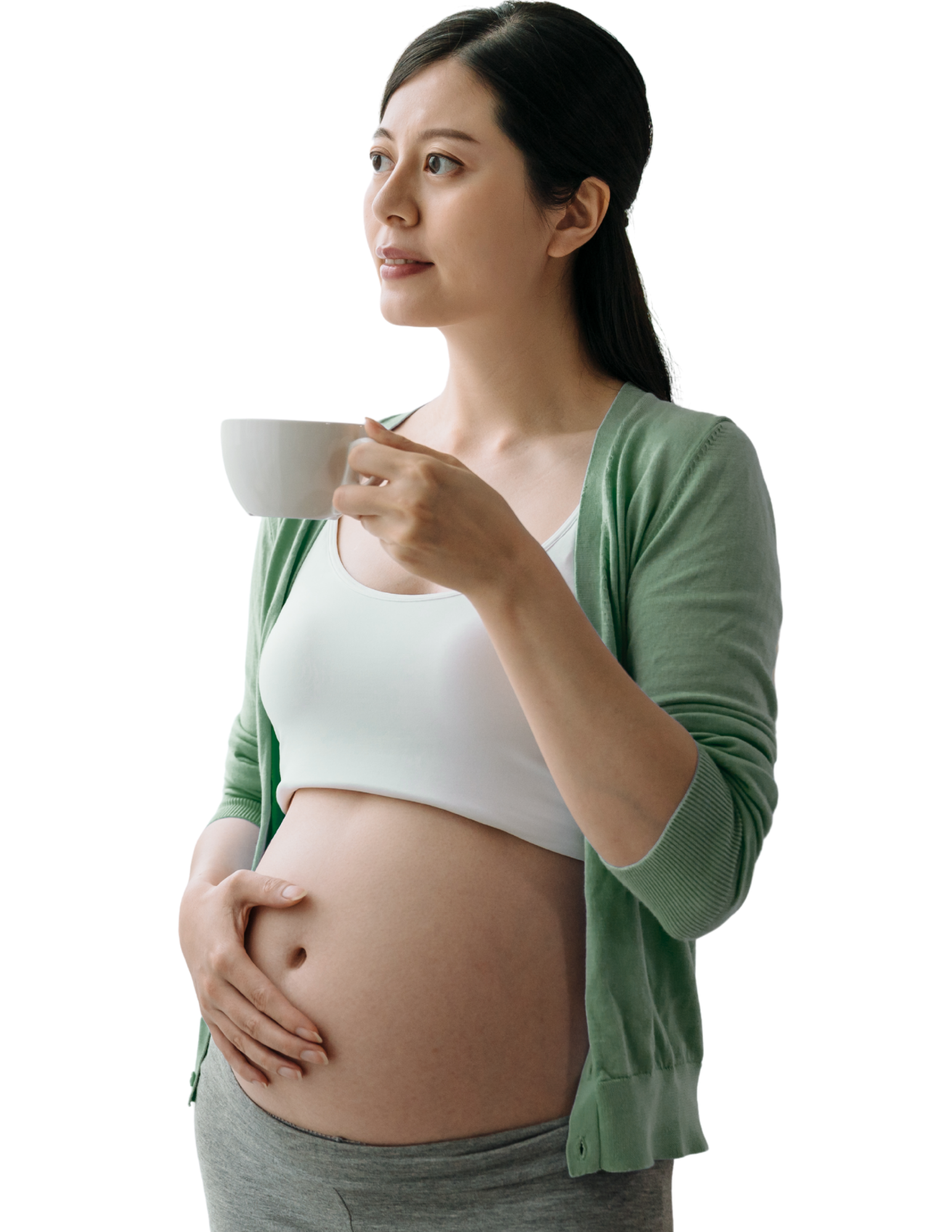 pregnant mom holding belly and drinking tea at adrouny village wellness prenatal preparation class in san jose california