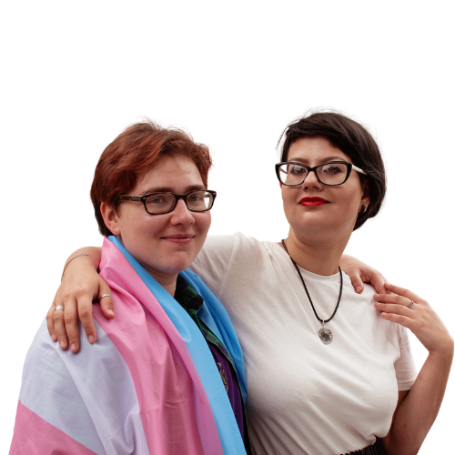 lgbtq+ couple with short hair wearing trans flag