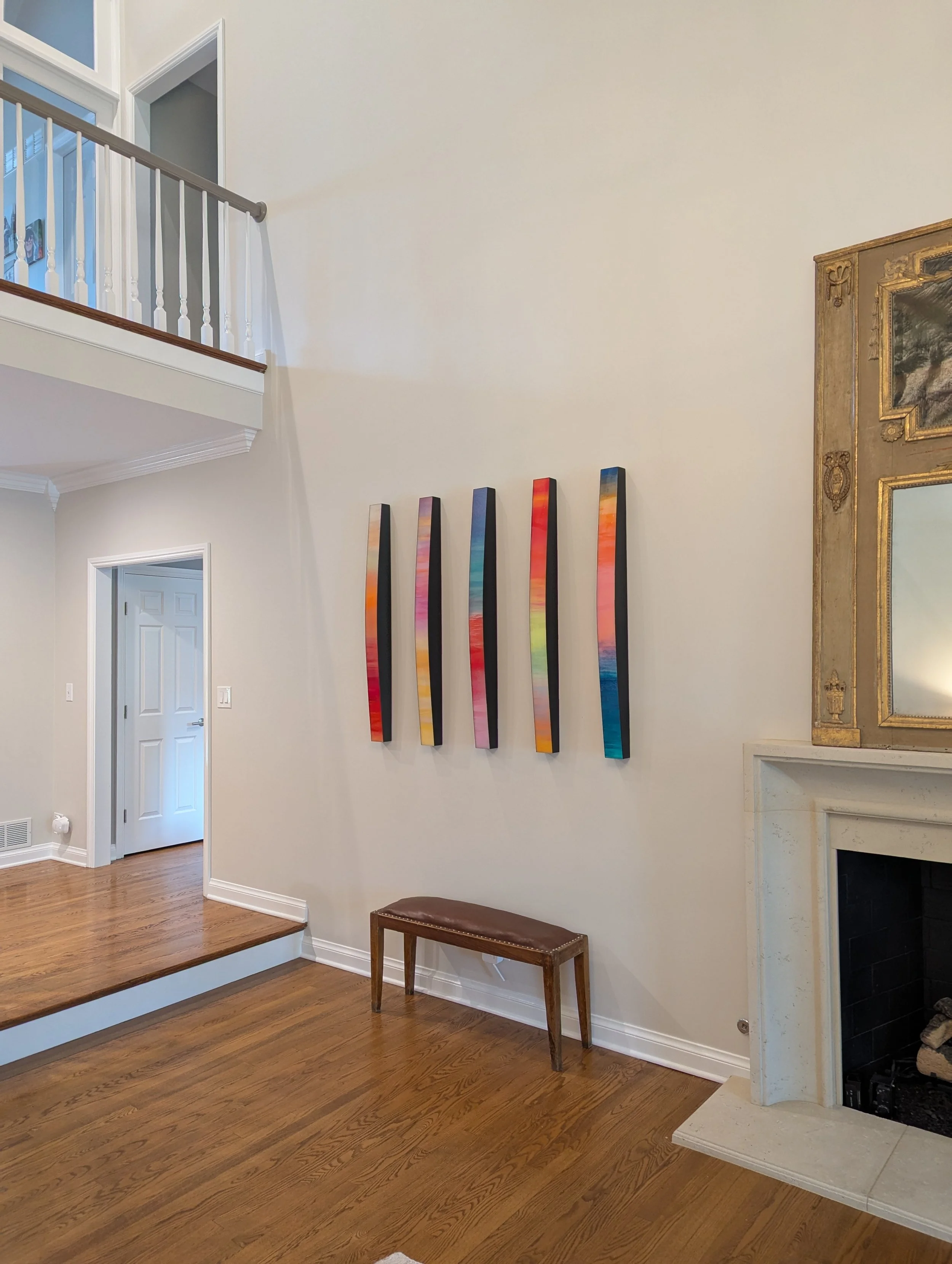  The subtle interplay of light and shadow is enhanced by the arched sculptural shape. This dimensional curve reminds us of the roundness of our planet Earth, and combined with the verticalness of the painting, evokes sunsets, horizons, storms, oceans