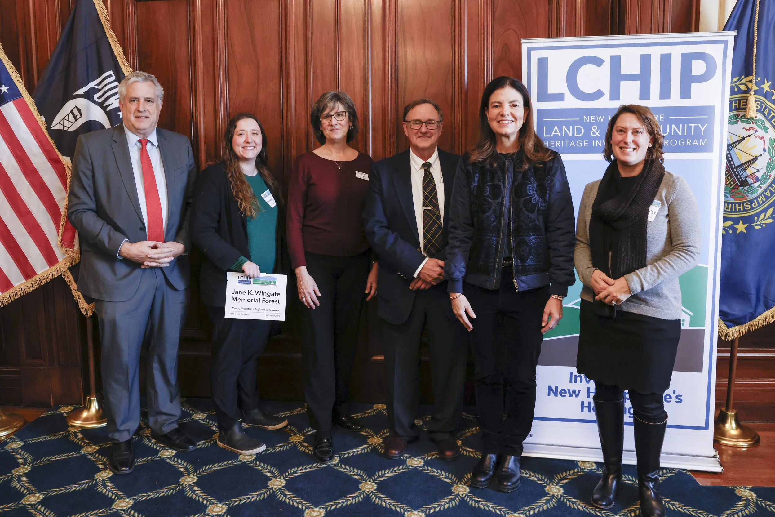   Moose Mountains Regional Greenways Staff Accepts 2025 LCHIP Award for the Jane K. Wingate Memorial Forest. Photo Credit: Cheryl Senter.  