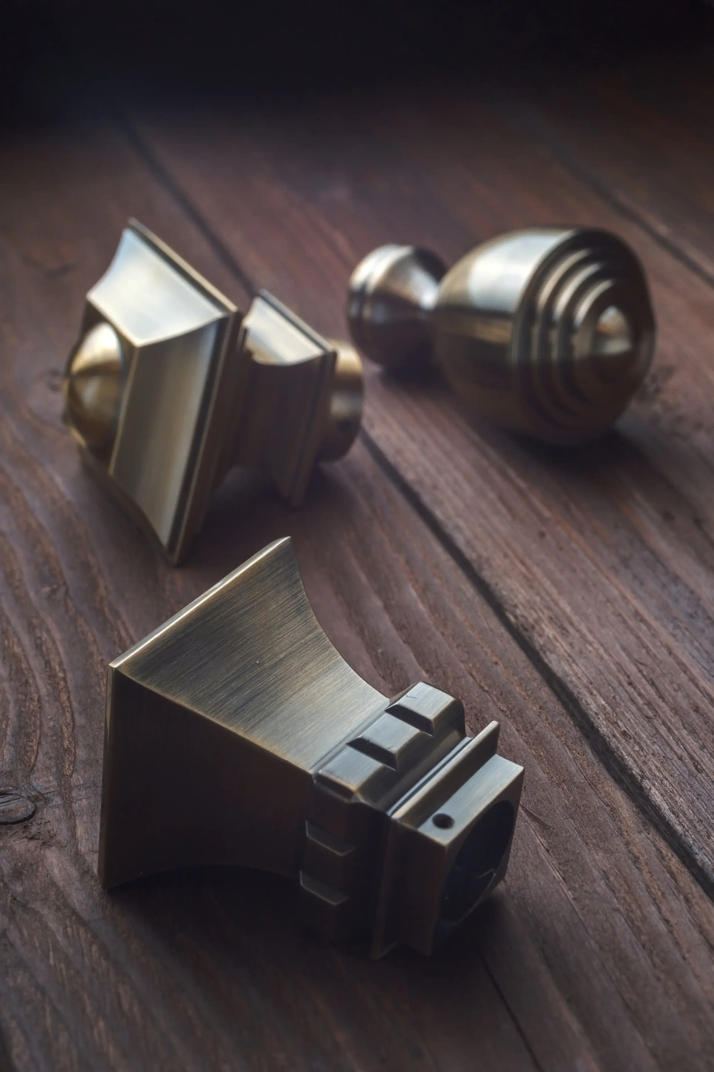 Designer drapery finials in various metal finishes