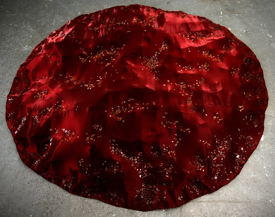 Lava , 2007, 12  x 144 x 144 in., iridescent satin cloth, felt cloth, aluminum screen, glass shards