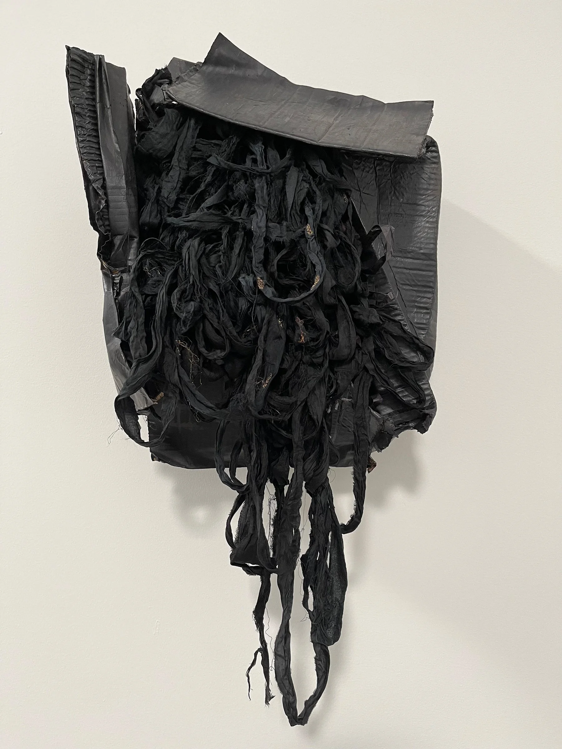 Crushed , 2022,  28 x 26 x 10 in., recycled silk sari, cardboard box, paint, staples