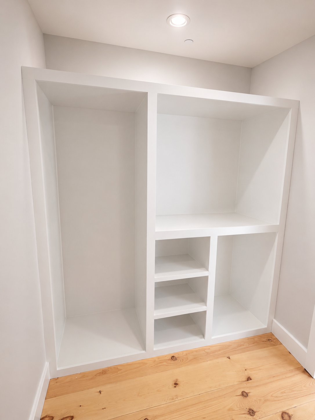 Custom walk in closet, with shoe rack.