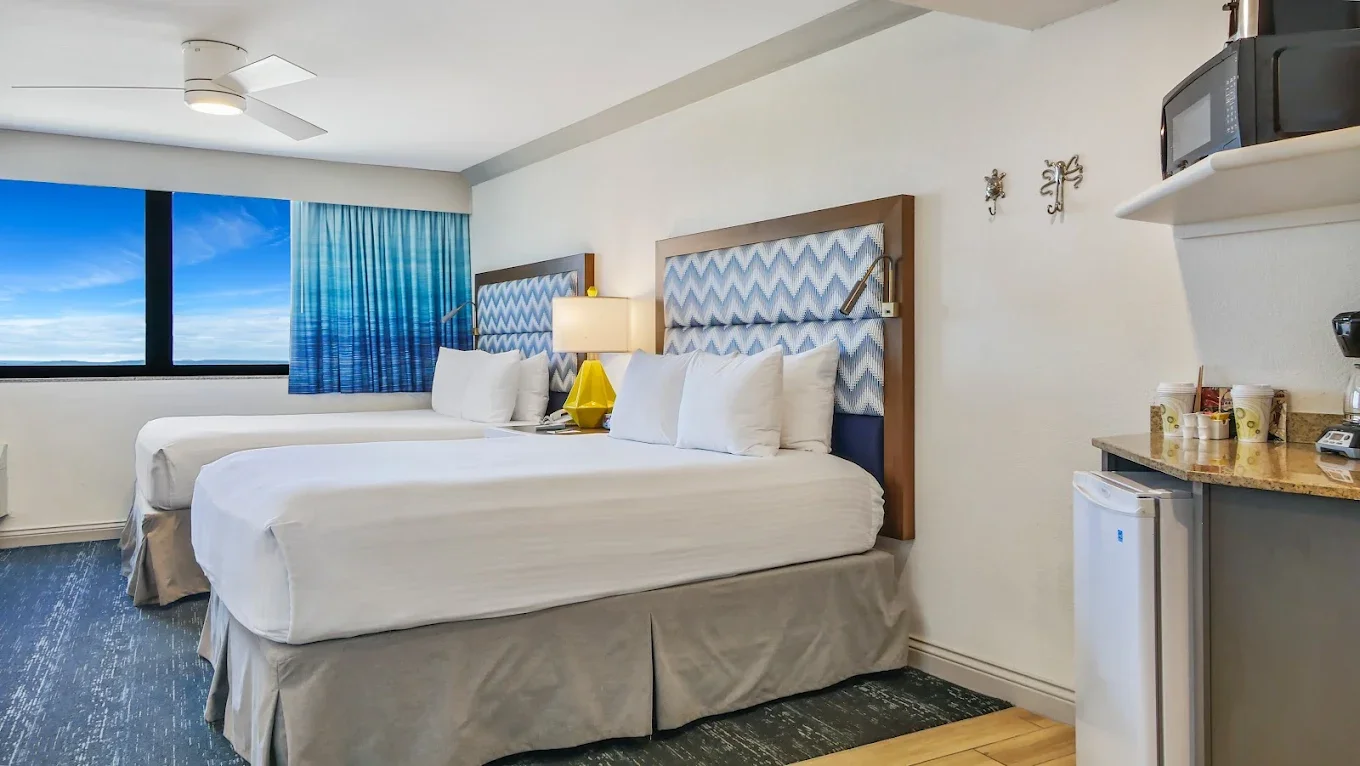 2 Queen Beds and Partial Kitchen Room 434.webp