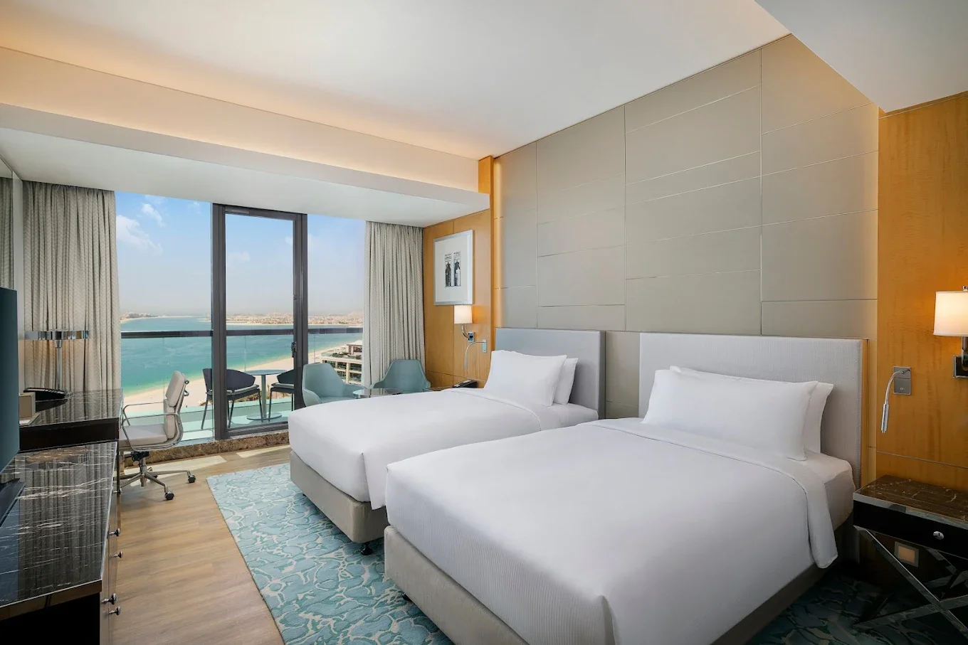 Hilton-Dubai-Palm-Jumeirah-Two-Double-Beds-Guest-Room-With-Sea-View.webp