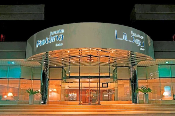 night view of the front entrance of Jumeira rotana