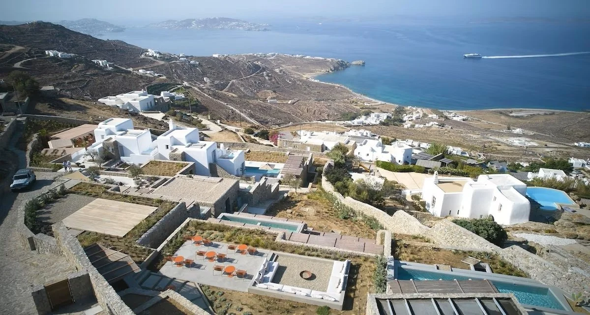 exterior aerial view of Collini Hotel Mykonos and sea