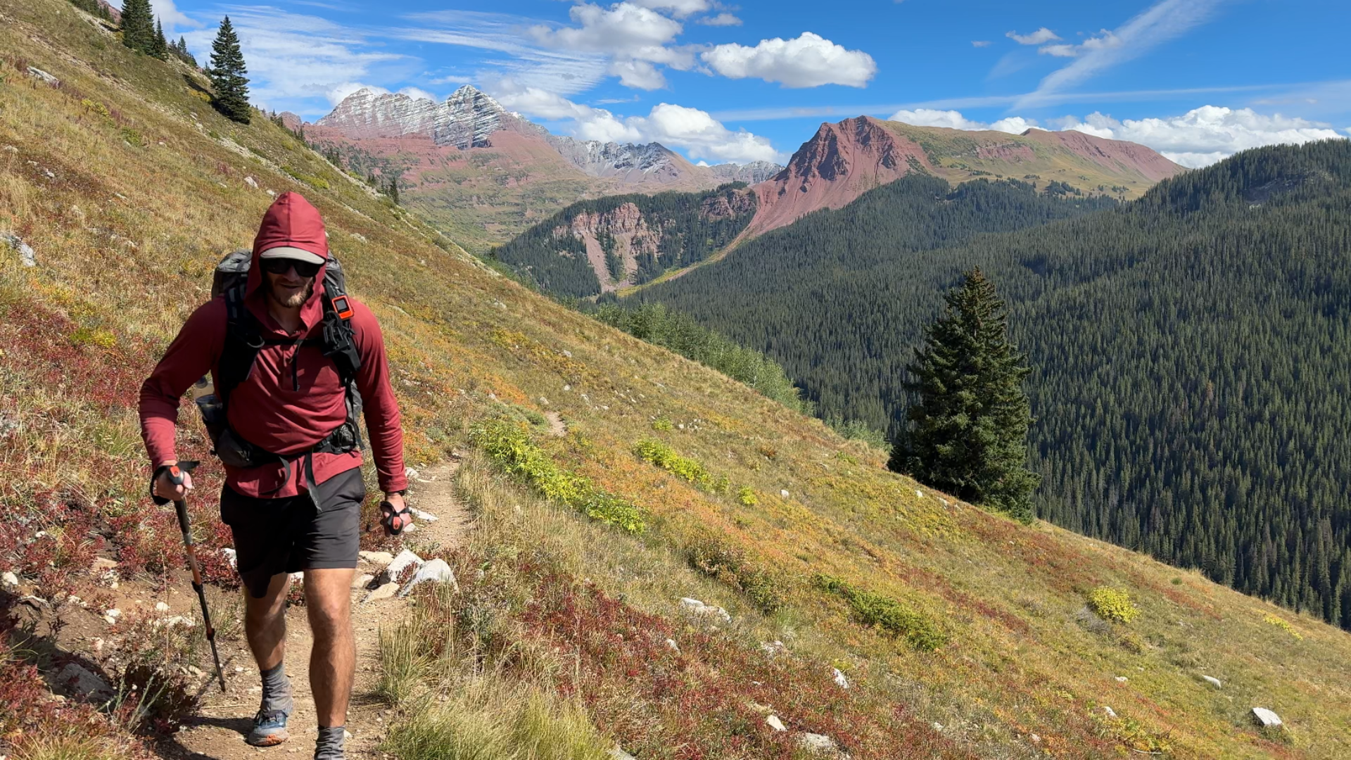 A hiker backpacking the Four Pass Loop in Colorado wearing the Ketl Mountain Nofry Sun Hoodie