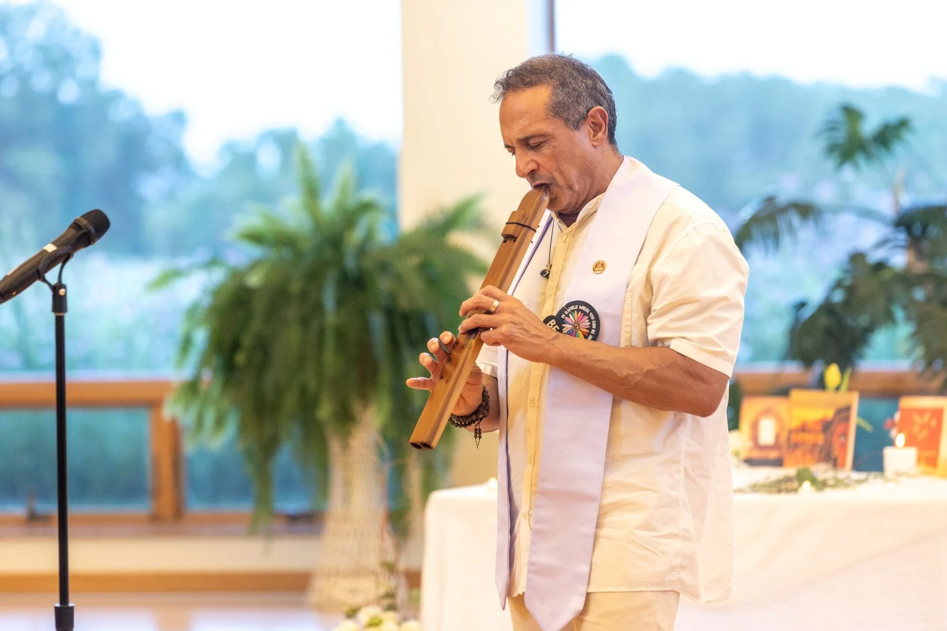 Rev. Frankie shares his gift of music during commencement. 