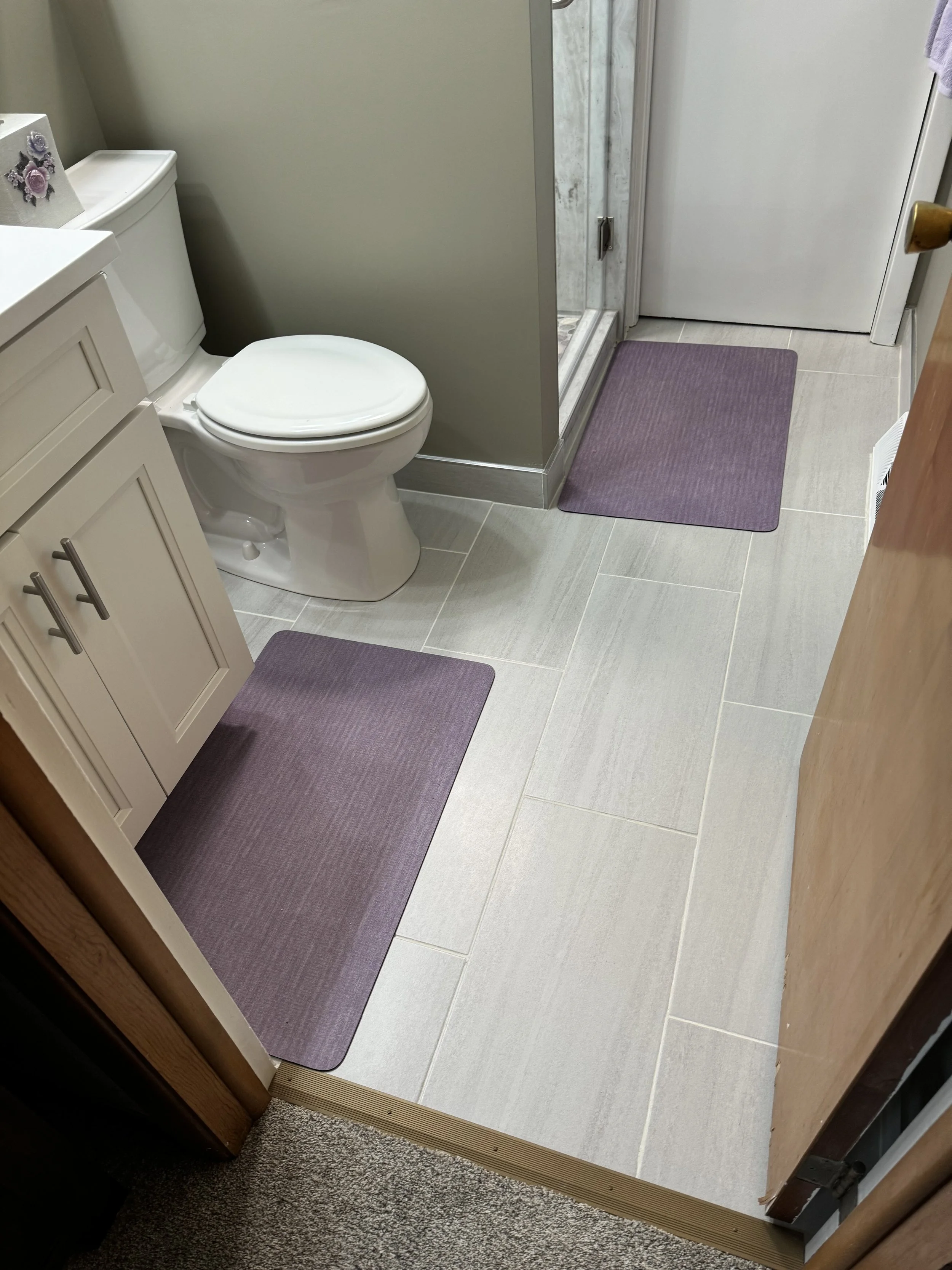 TILED FLOOR AND BAASEBOARD FULL BATHROOM REMODEL