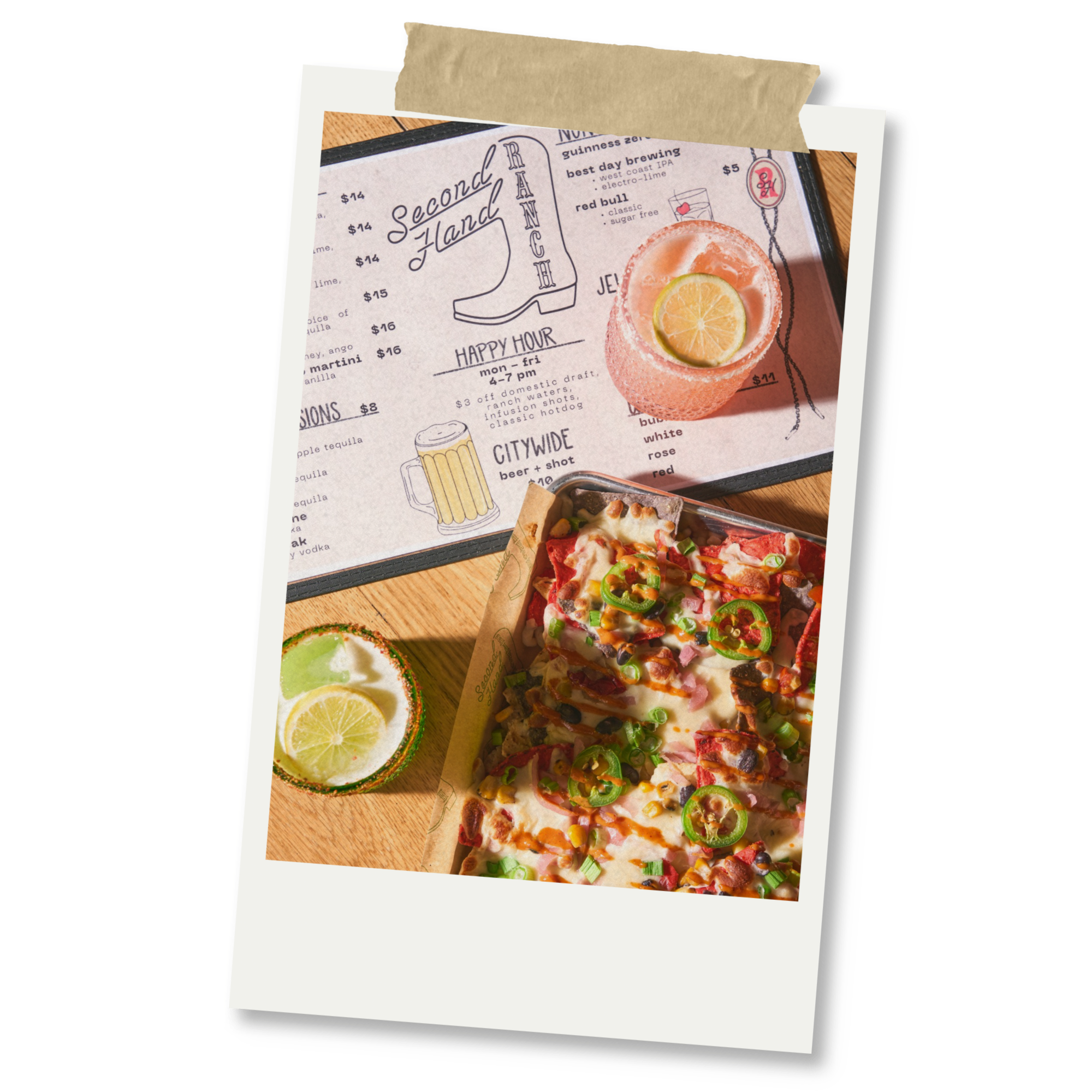 Layflat image of nachos, margaritas and a menu