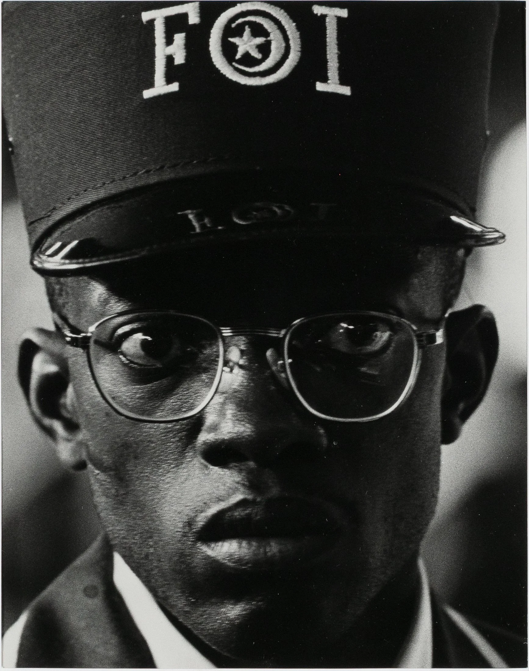 Savior's Day Attendee, 1965, printed 1988;
gelatin silver print,
13-1/2 x 8-1/2 inches (image), margins.
Written on verso in pencil: This photograph was taken by Robert Abbott Sengstacke during the Saviors Day gathering, during the late 60's in Chi