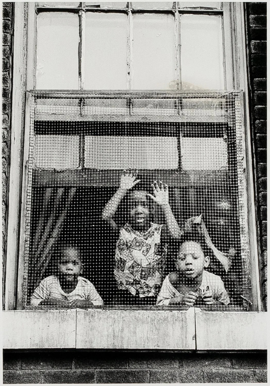 A Screen Scene (Chicago), 1964; gelatin silver print, 14 x 11 inches (sheet), signed and dated; stamped (Amalgamated Publishers).