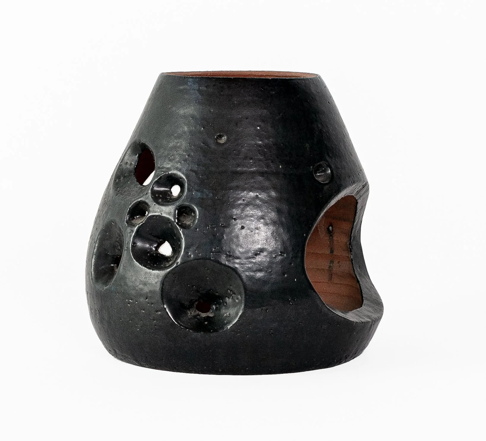 glazed terra cotta vessel
8-1/2 (h) x 8 inches (diameter at widest point)