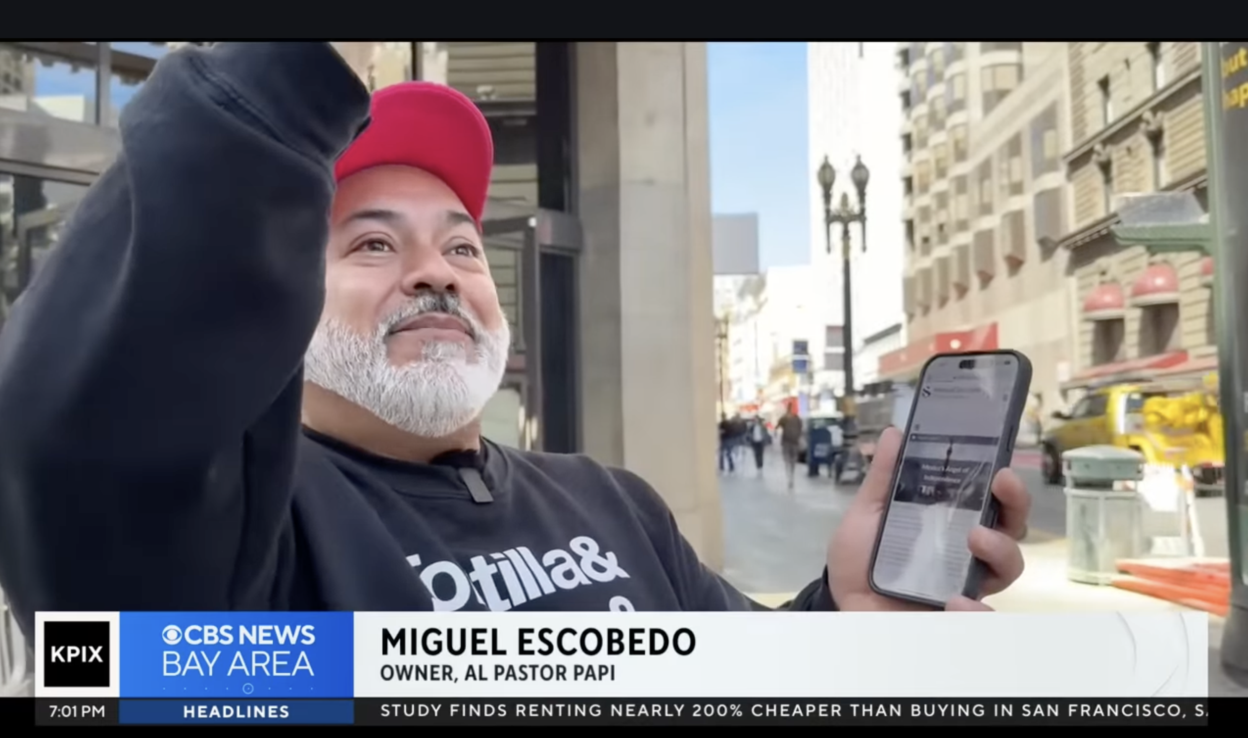 Miguel Escobedo, owner of the taquieria Al Pastor Papi, being interviewed by CBS News Bay Area