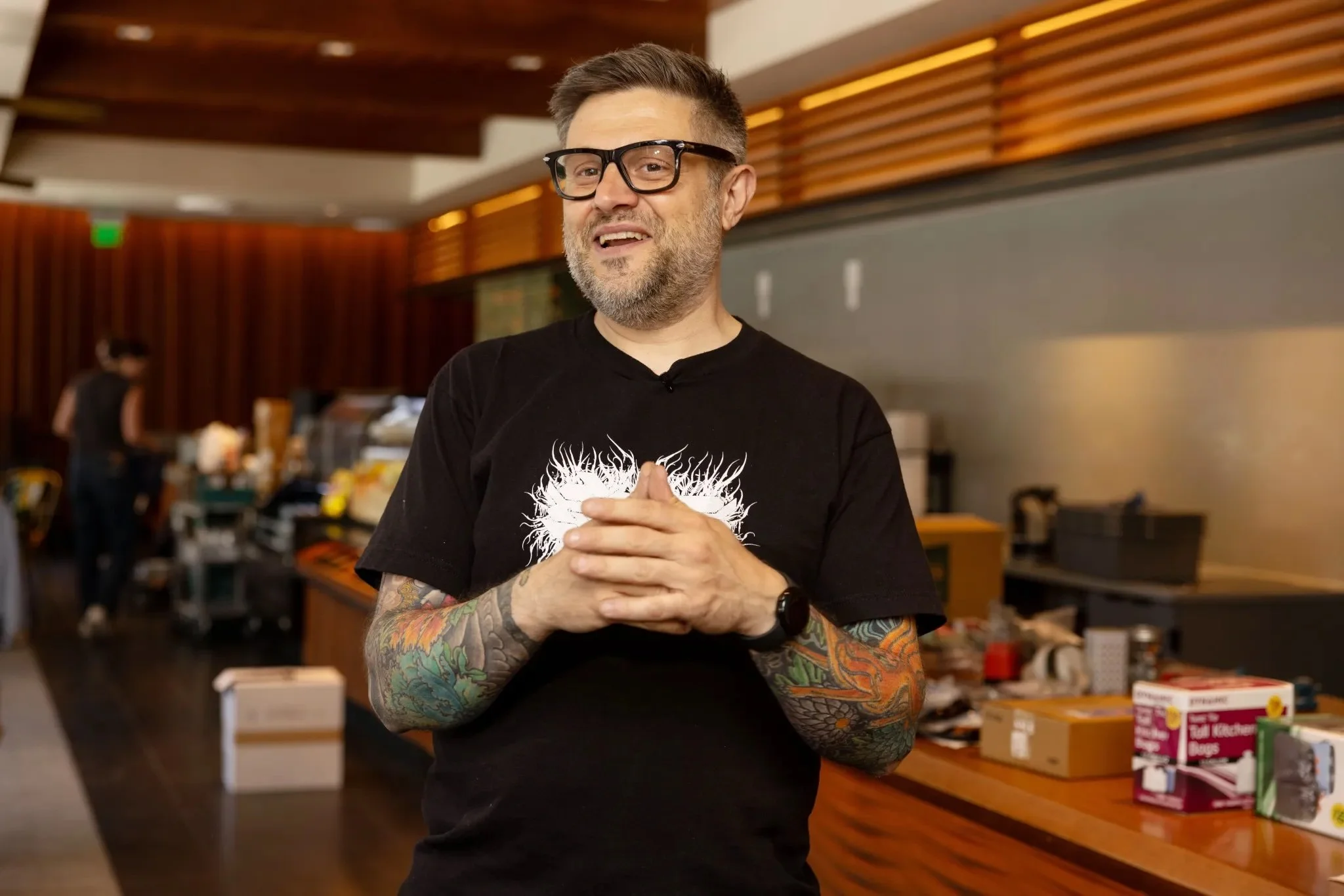 Dario Barbone smiles in excitement ahead of the opening day of Aurora Centro, his new Vacant to Vibrant pop-up deli shop.