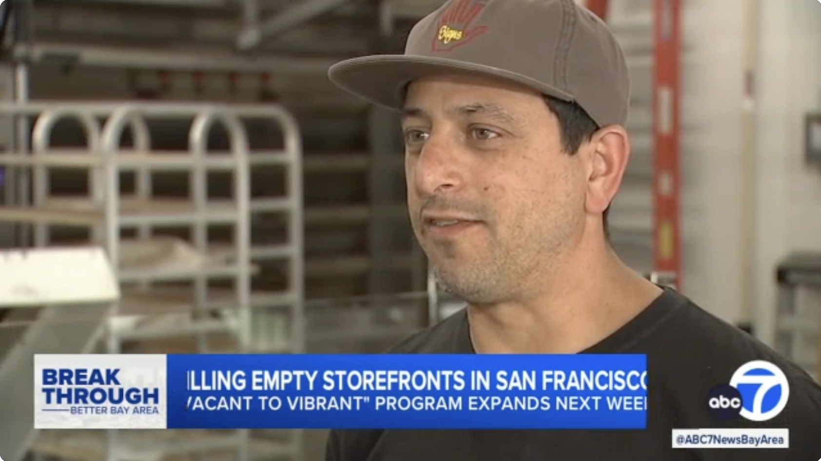 Rosalind Bakery owner Matthew Kosoy being interviewed by ABC7 in his bakery.