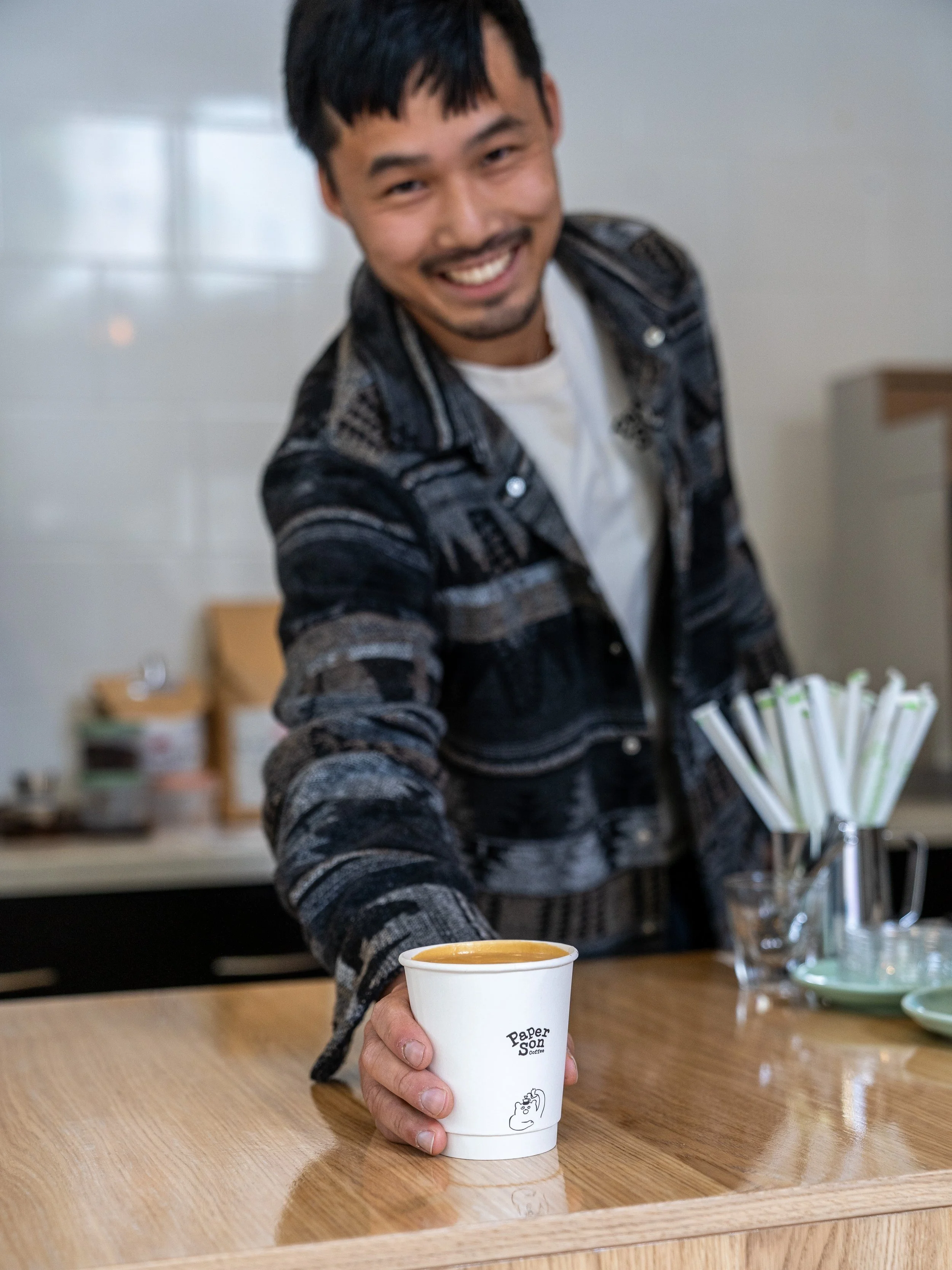 Photo of Alex, Co-Owner of Paper Son Cafe