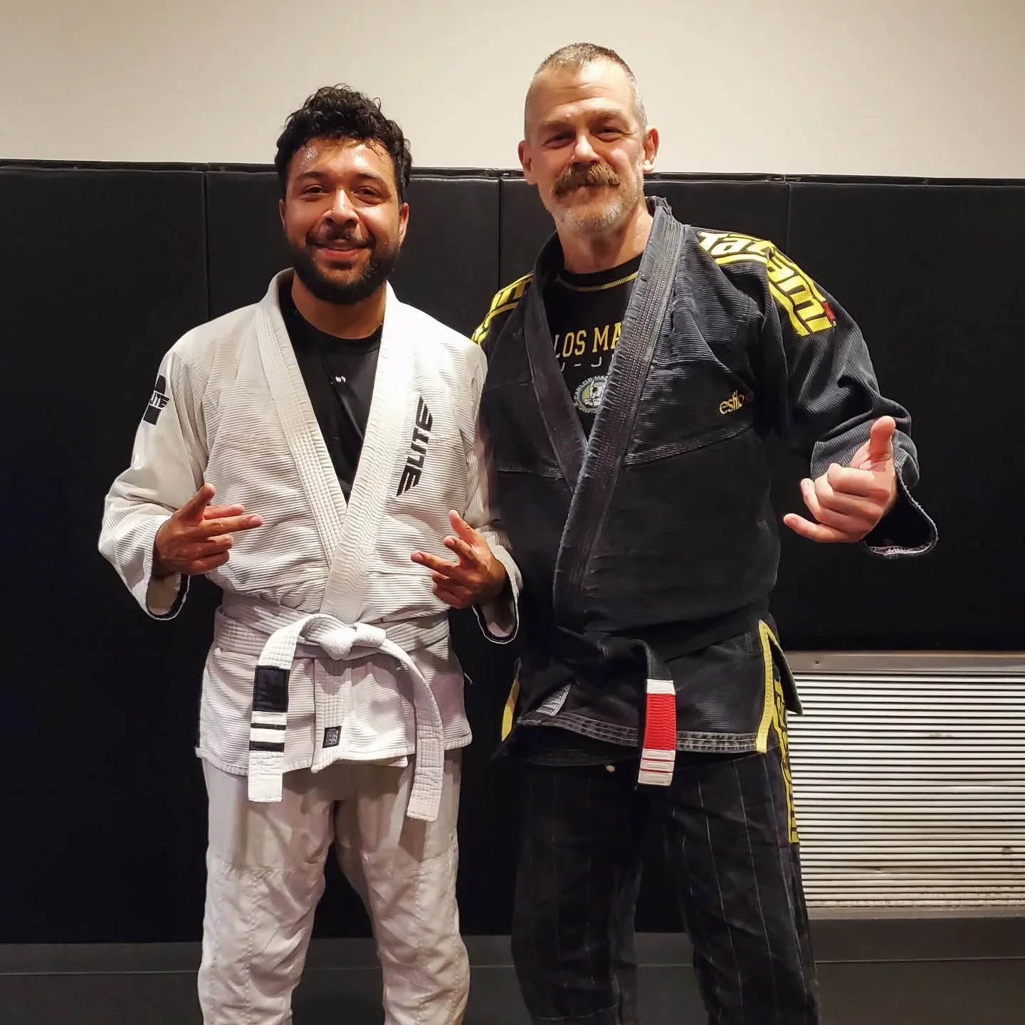 @uglyandres earning his 2nd stripe!!! #brazilianjiujitsu #bigbiceps #mountescape