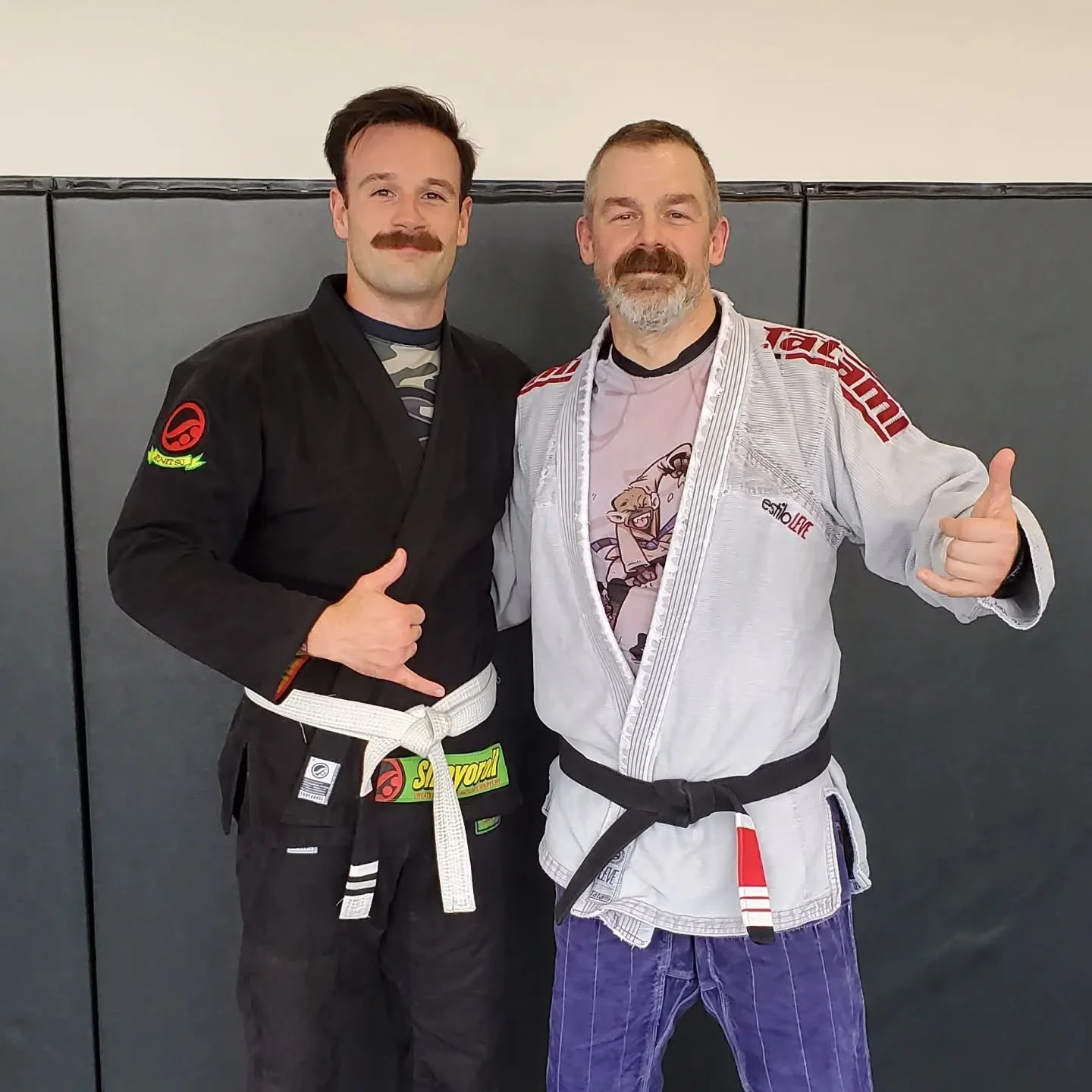 @ocallaghanavery earning his 2nd stripe!!! #brazilianjiujitsu #bigbiceps #mustache