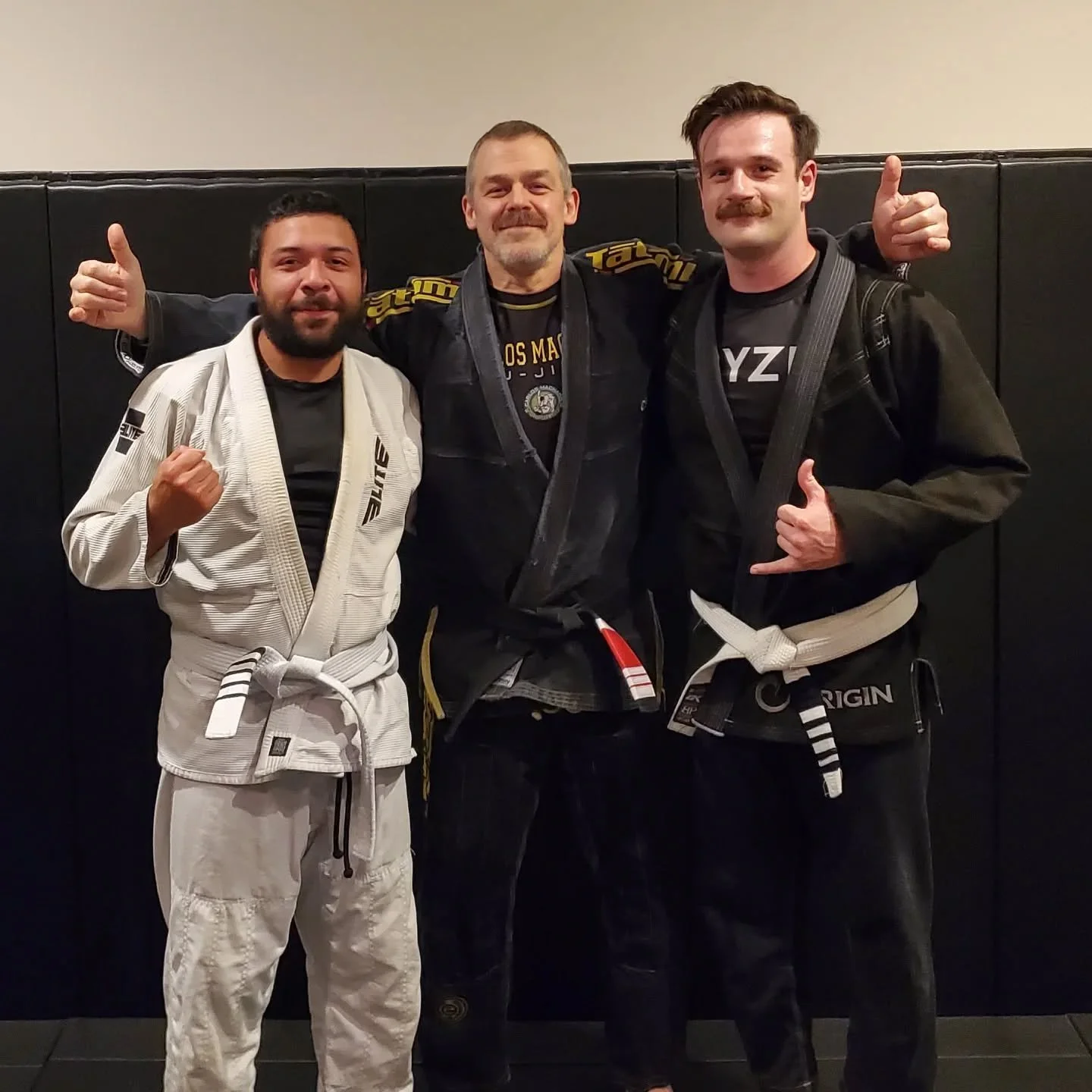 4th stripe for @ocallaghanavery and @uglyandres!!! #brazilianjiujitsu #bigbiceps #slowissmoothsmoothisfast