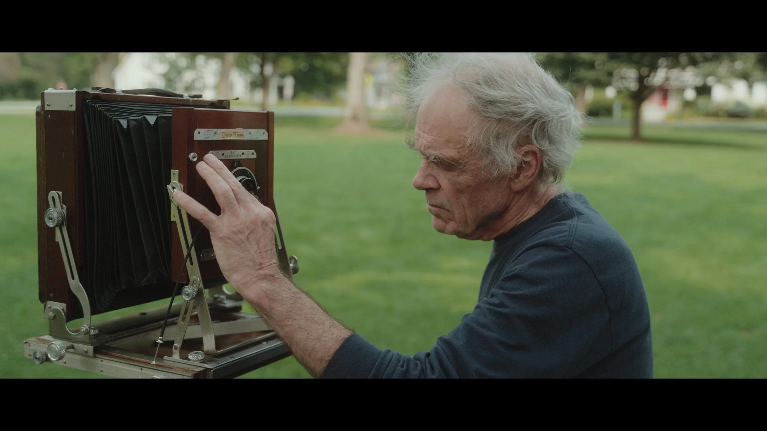 Jim Dow setting the aperture on his 8x10 large format camera in Rochester, Vermont.