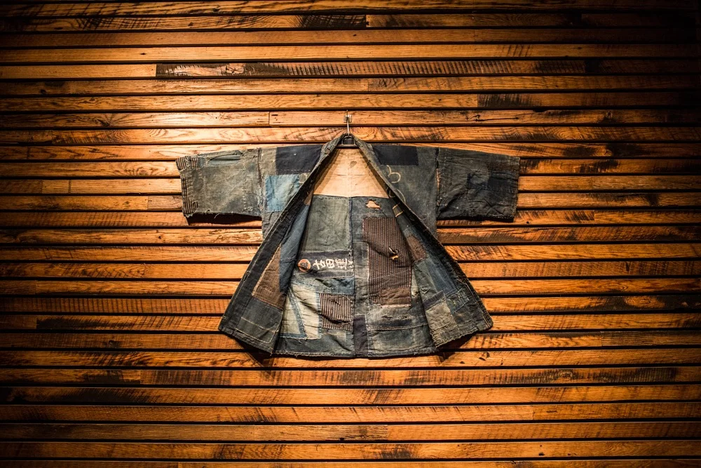 Two Ten Jack Jacket on Wall tennessee smokehouse wall
