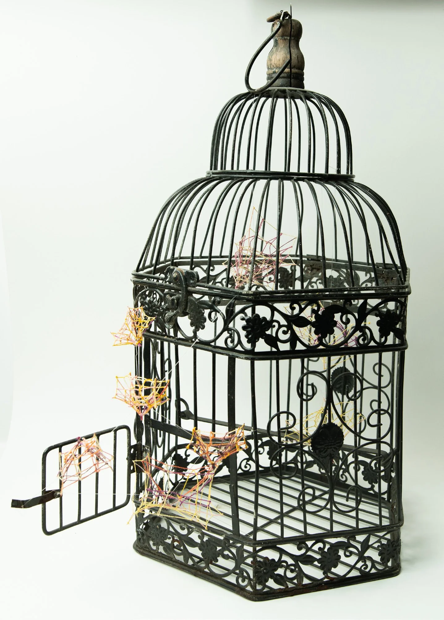 Ancestor's Release • Bird cage, embroidery floss, filament • 17 x 18 x 10 in • 2021