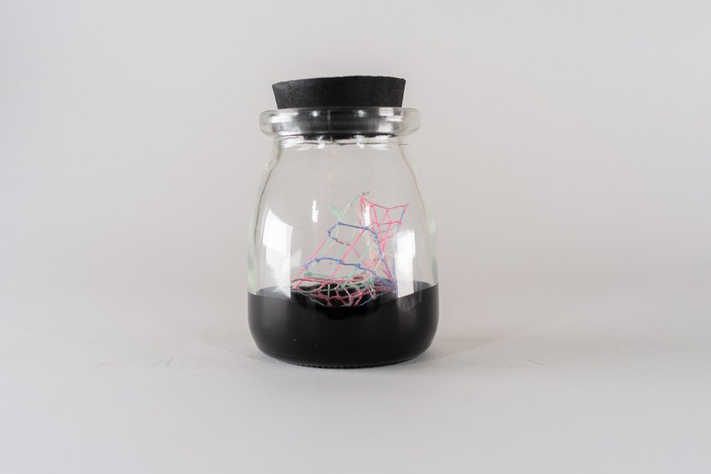 Small Ideas 2 • Embroidery floss, paint, glass jar • 2 1/4 x 2 1/4 x 3 1/2 in • 2022