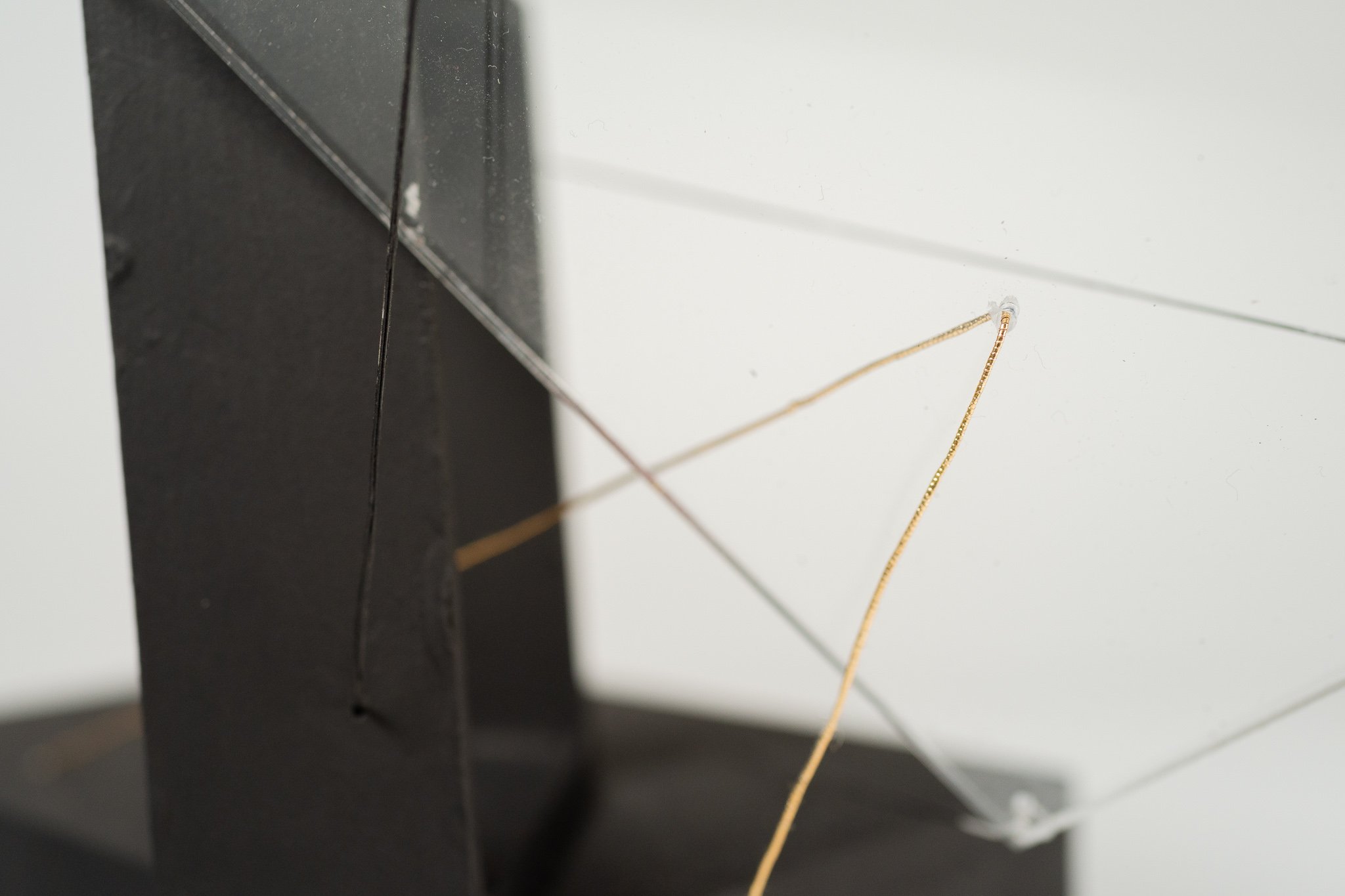 Assimilated Framing • Acrylic sheet, clear cord, embroidery floss, cardboard frame, wood base • 10 x 5 x 7 in • 2021