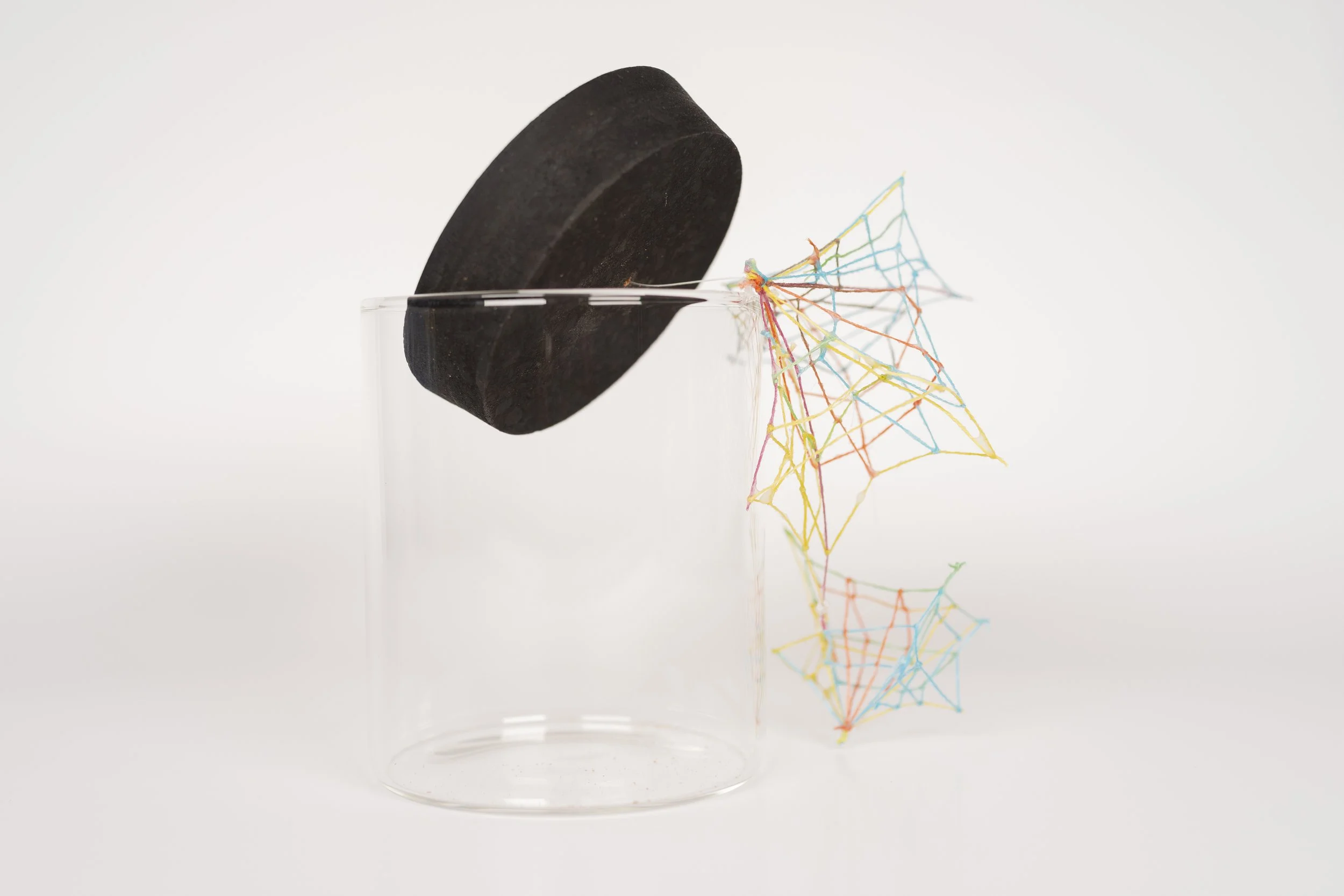 Specimen No. 3 • Embroidery floss, clear cord, corked glass jar • 5.5 x 4.5 x 6.5 in • 2021