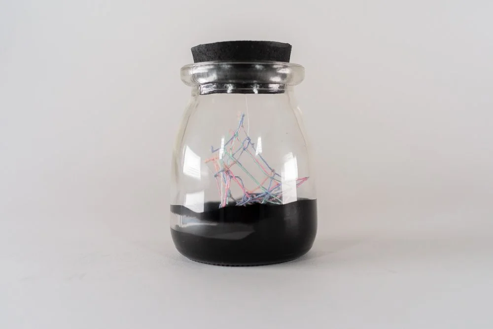 Small Ideas 5 • Embroidery floss, paint, glass jar • 2 1/4 x 2 1/4 x 3 1/2 in • 2022