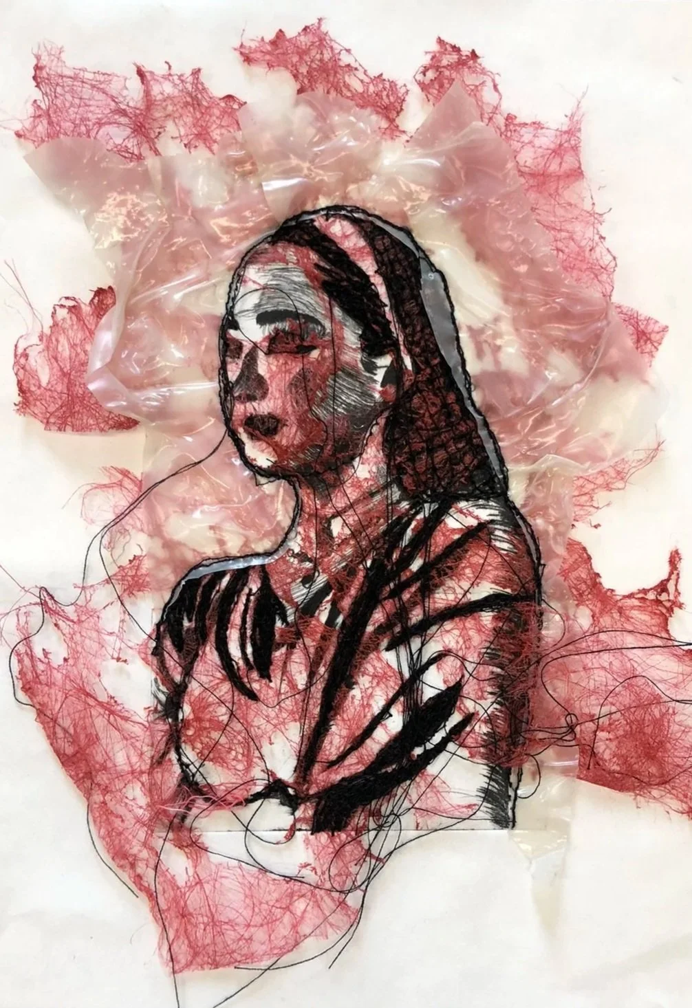 Etching on paper embroidered into with layered appliqué. The burnt away appliqué is representative of Ehlers Danlos Syndrome, faulty connective tissue.