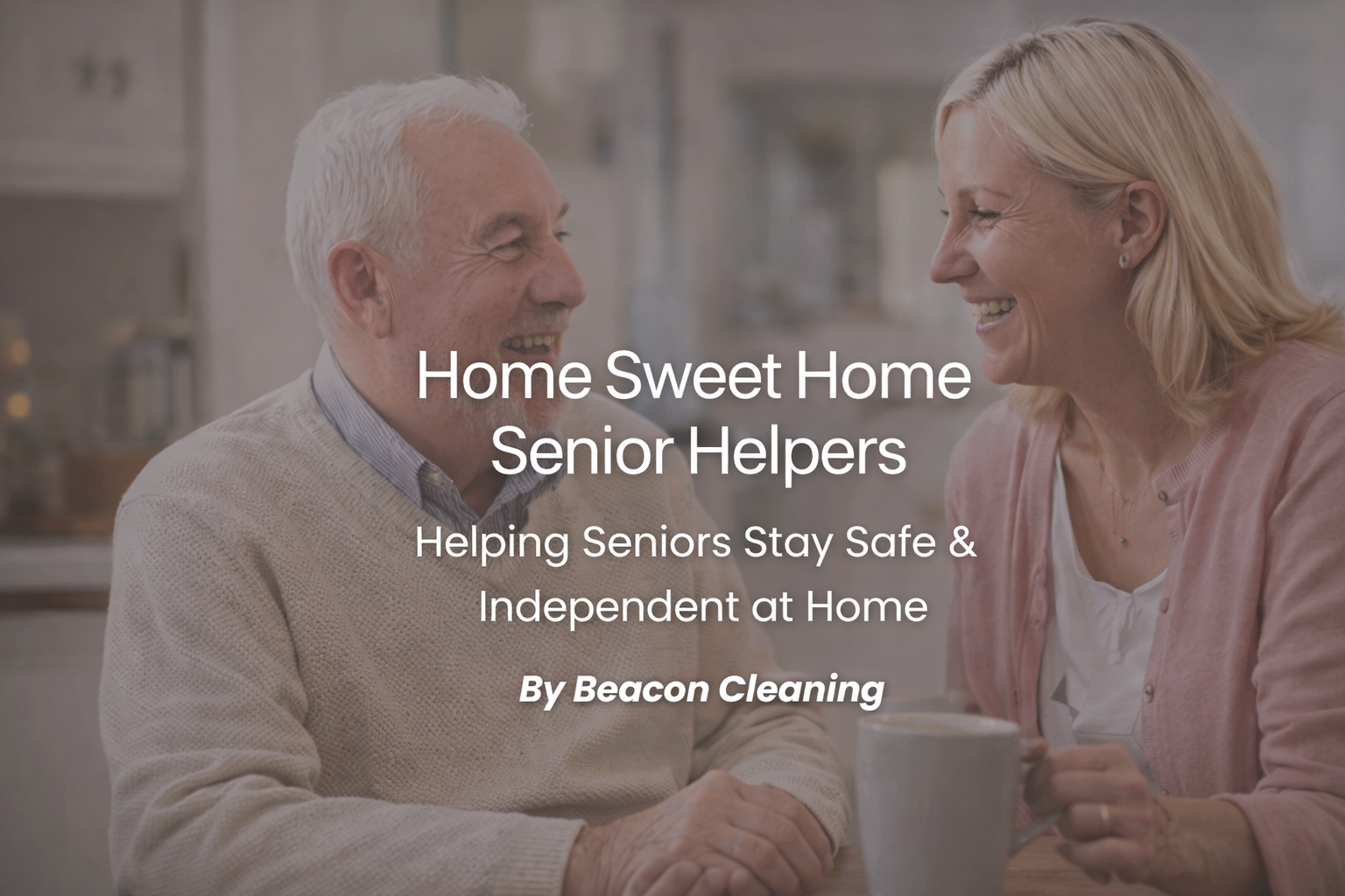 Smiling elderly man and woman having coffee and conversation in a cozy kitchen.